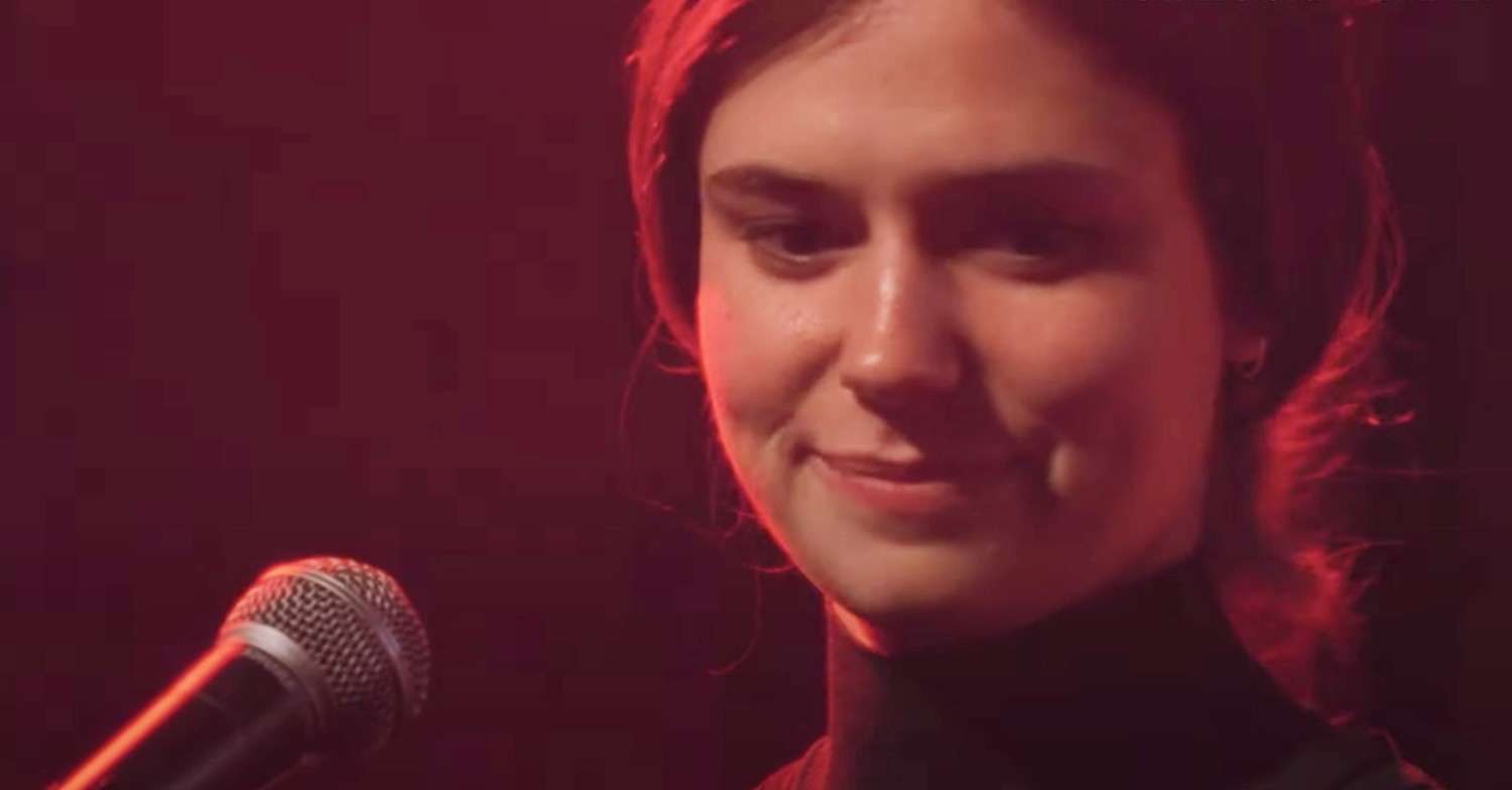 Alison Oliver smiling on Conversations with Friends