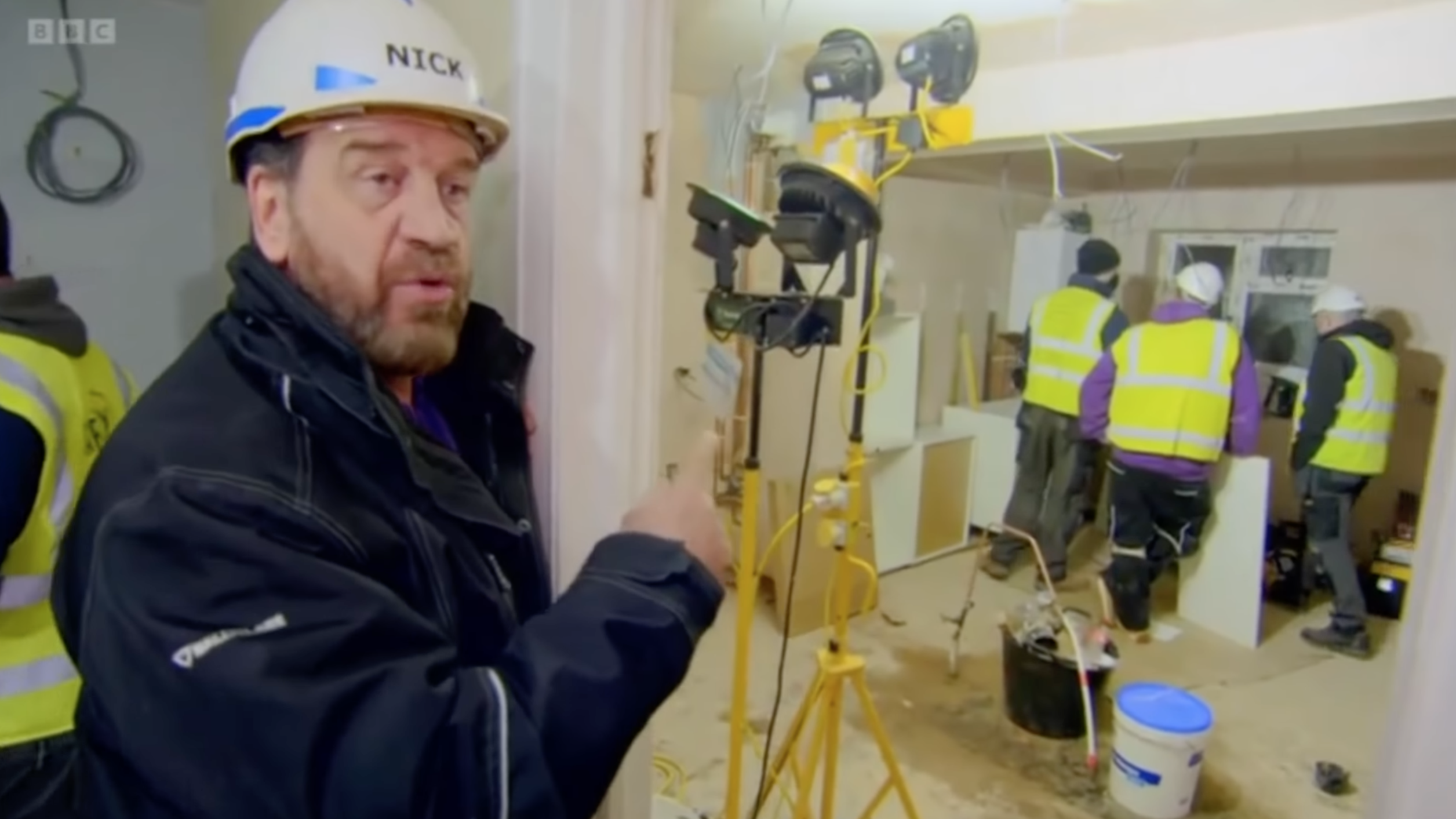 Nick Knowles on DIY SOS in a hard hat