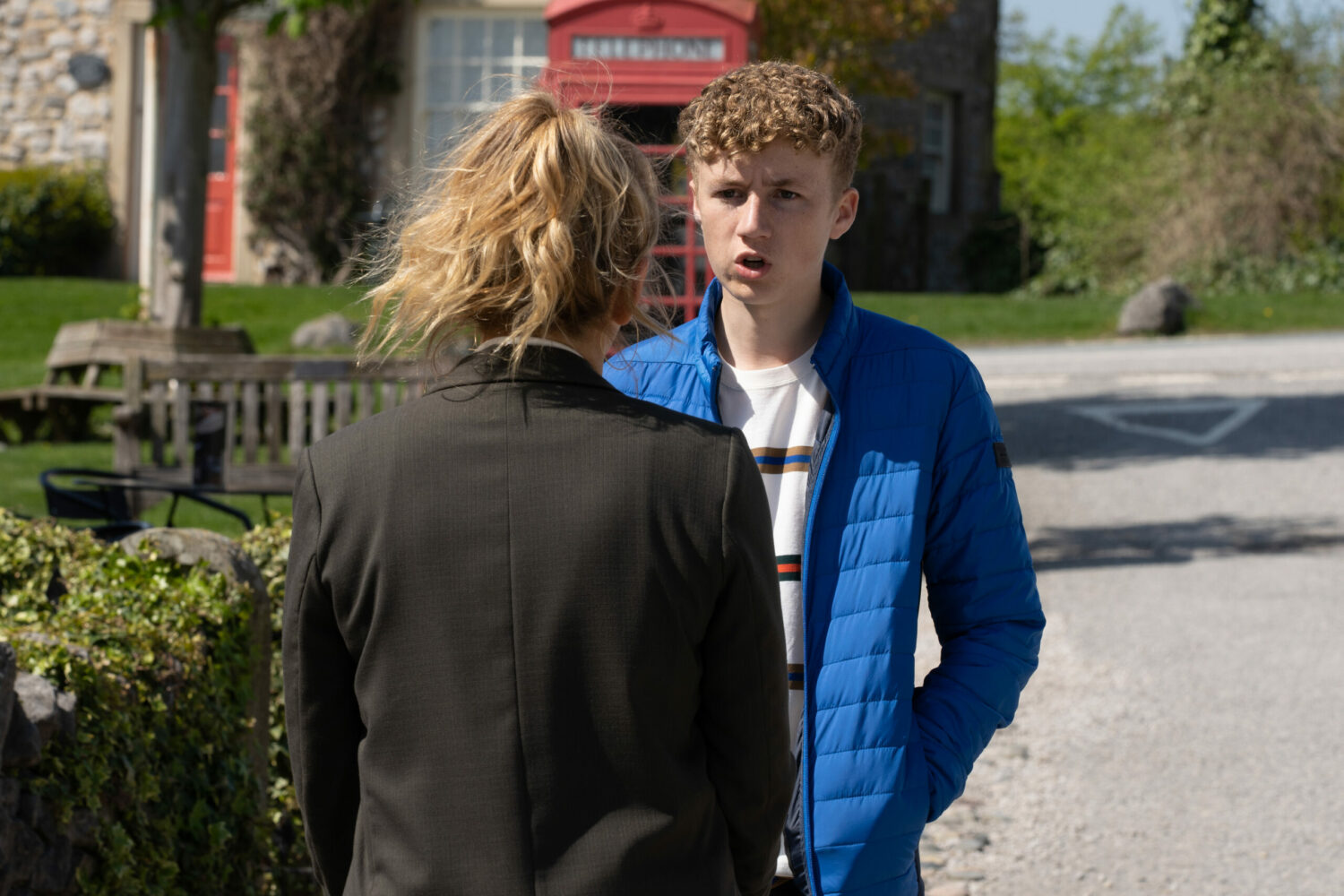 Noah and Charity talk in the street in Emmerdale