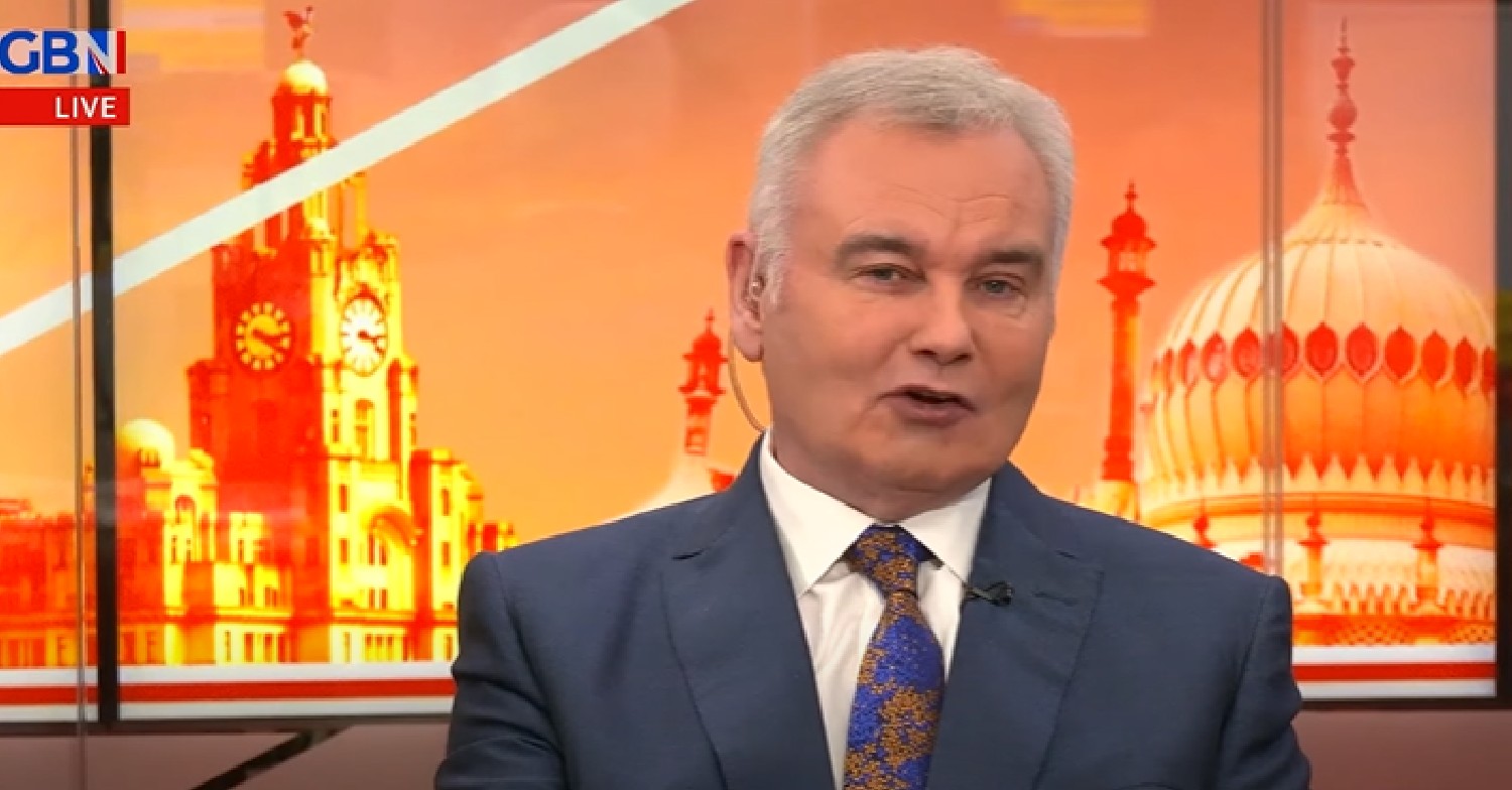 Eamonn Holmes in a suit looking at the camera on GB News