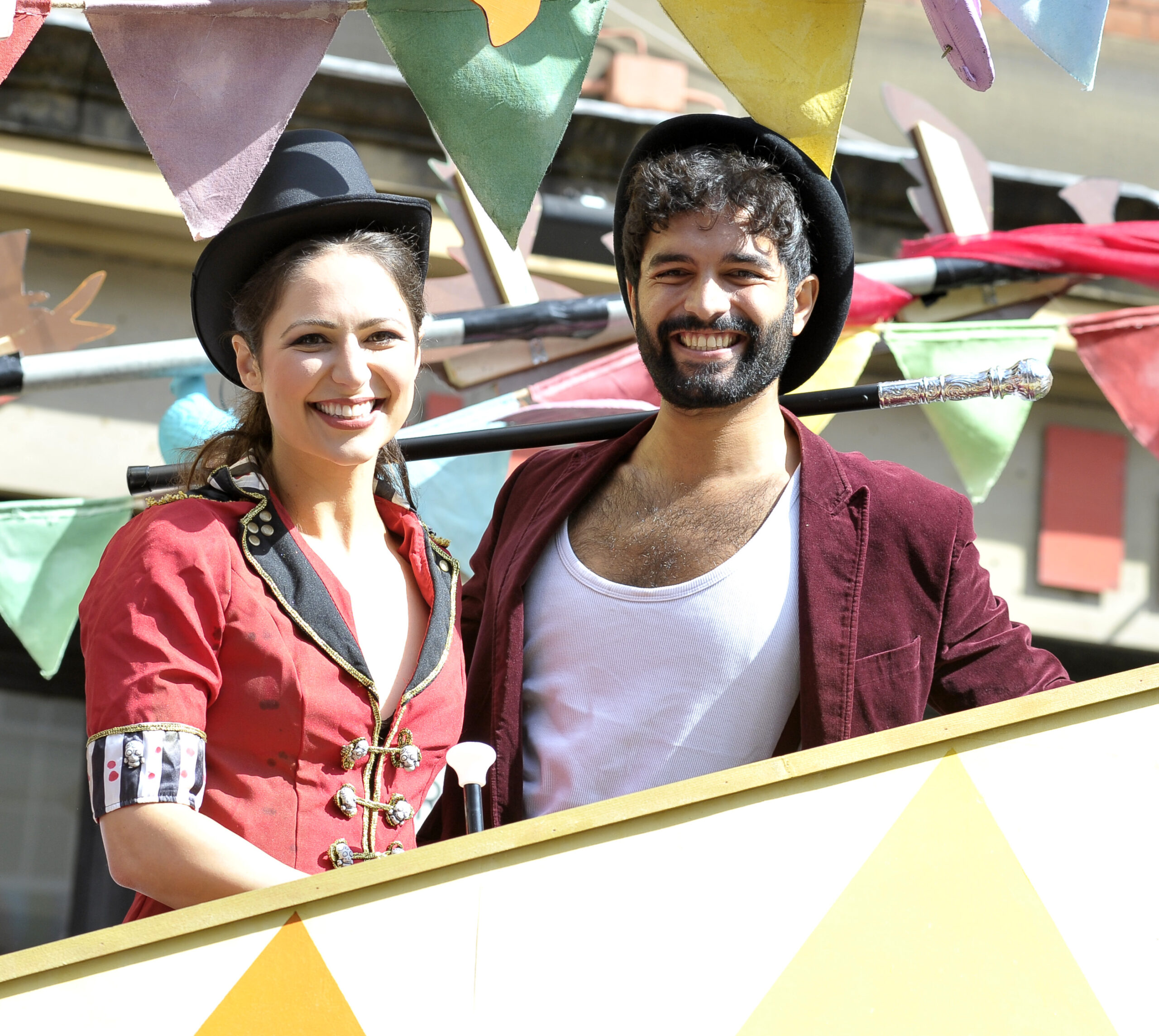 Nicola Thorp and Charlie De Melo beam on Coronation Street's Manchester Pride float in 2018