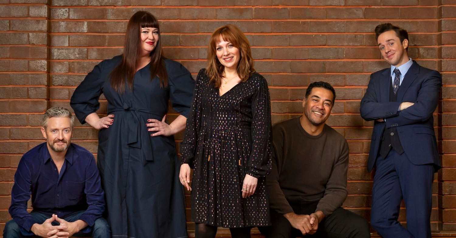 Spreadsheet cast smiling