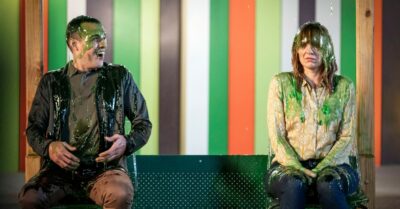 Katherine Parkinson covered in slime with another man on Spreadsheet