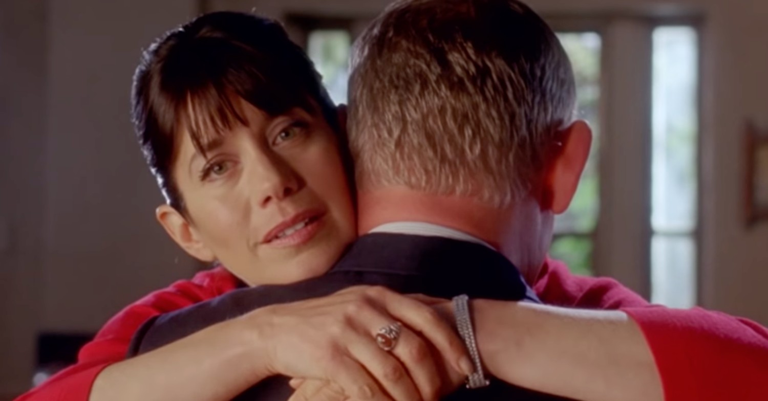 Doc Martin season 10 star Caroline Catz hugging Martin Clunes