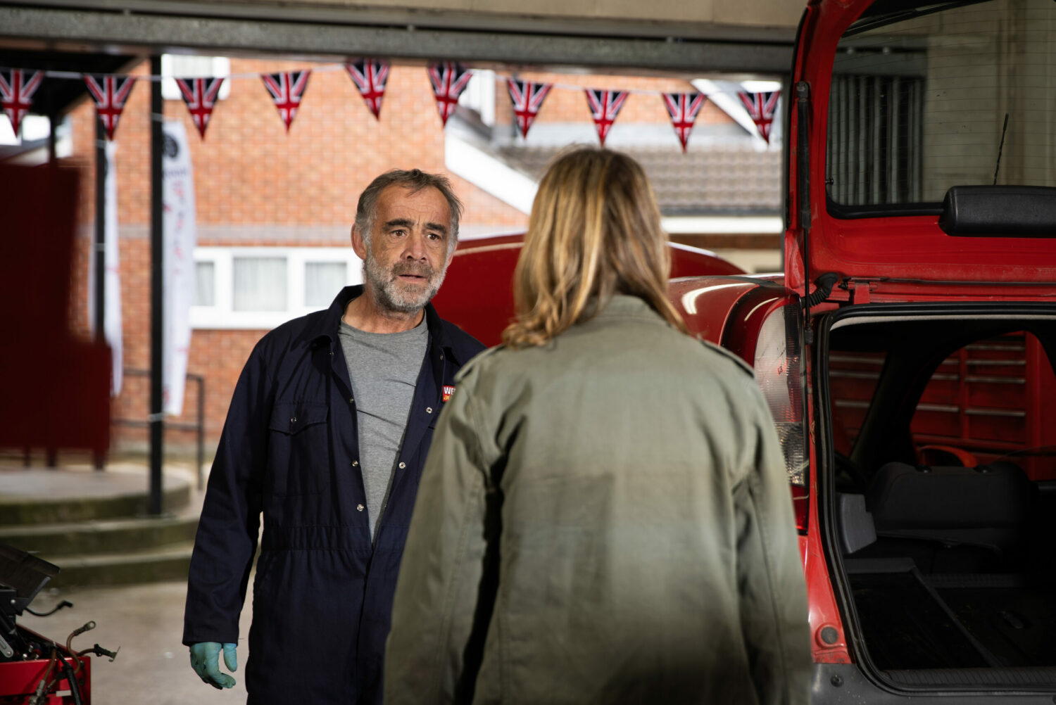 Kevin Webster looks stressed talking to Abi Webster