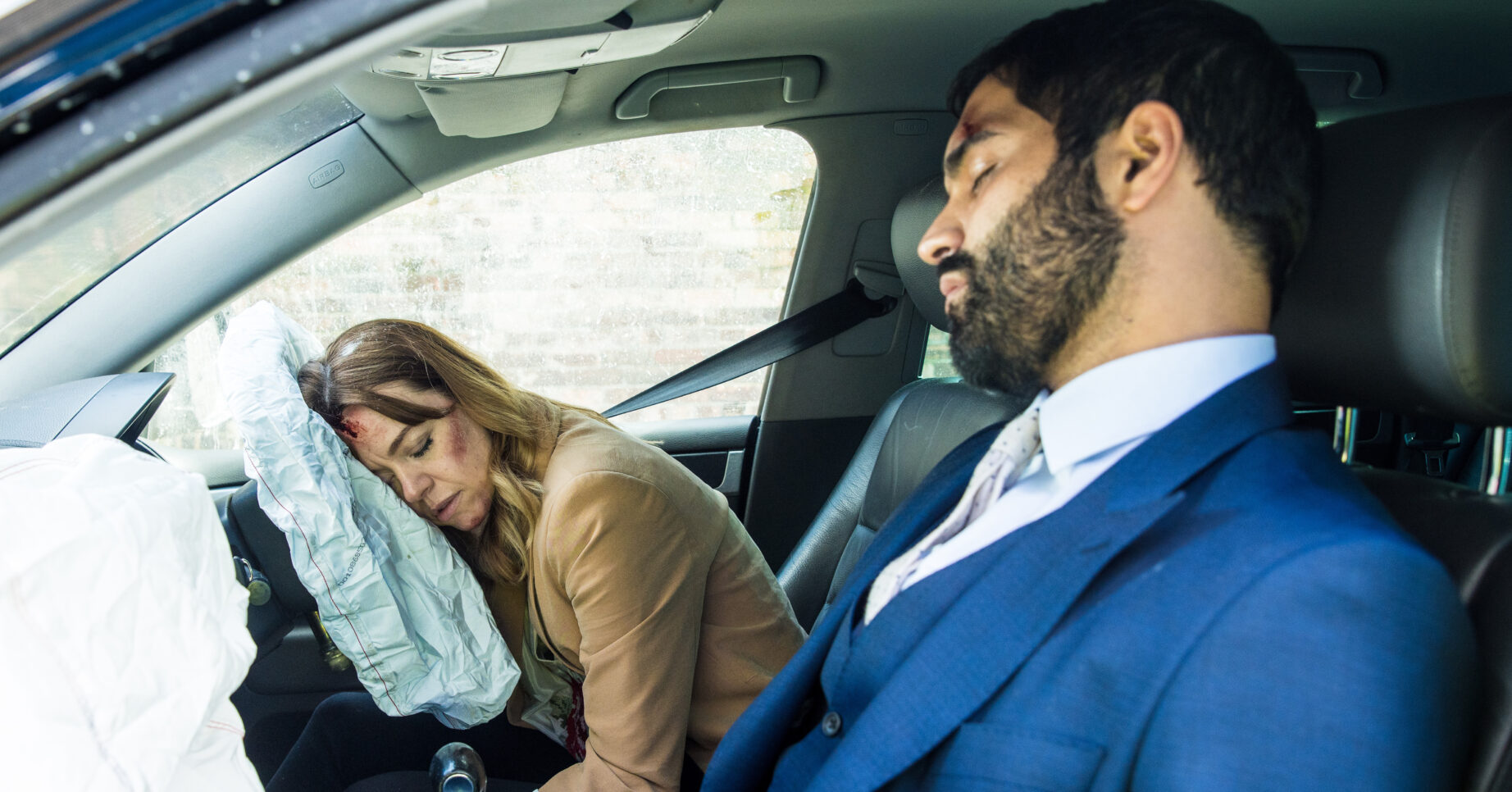 There is a car crash on Coronation Street and Toyah and Imran lie unconscious in the wreckage