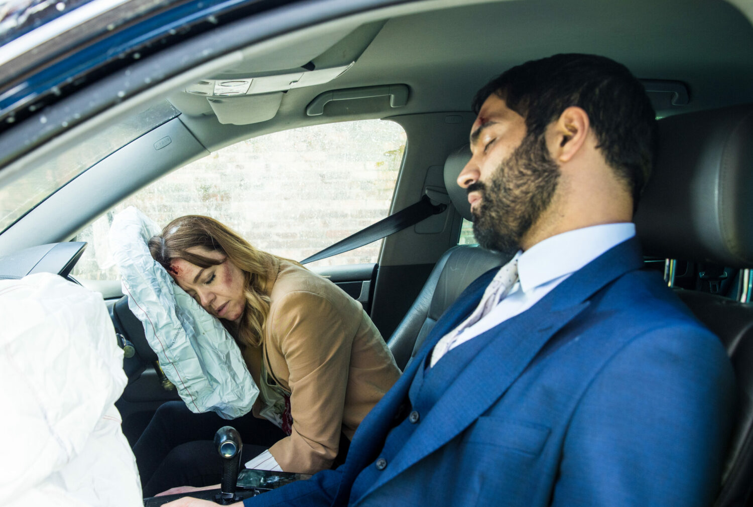 There is a car crash on Coronation Street and Toyah and Imran lie unconscious in the wreckage