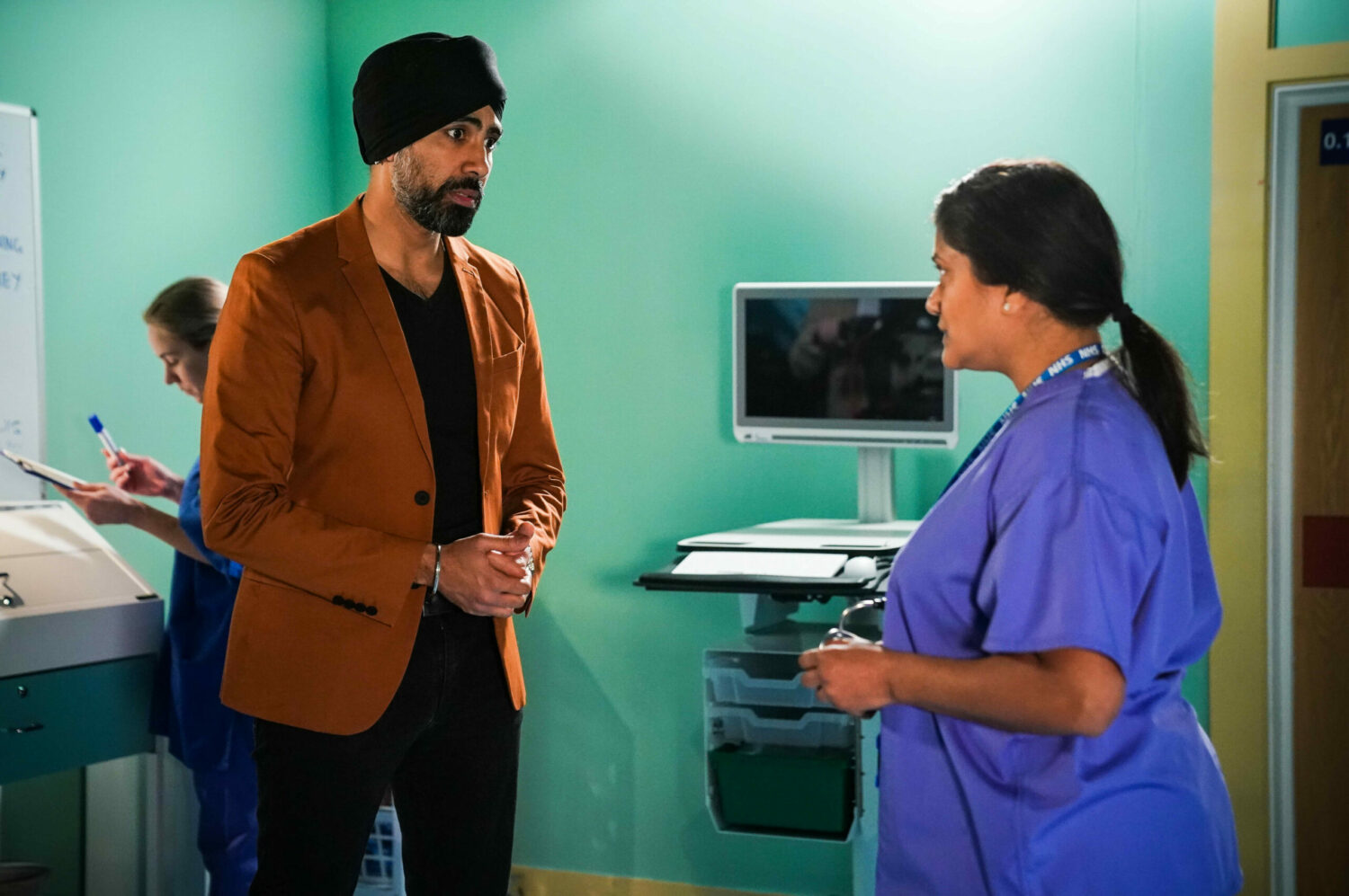 Concerned Kheerat Panesar talks to the doctor in hospital