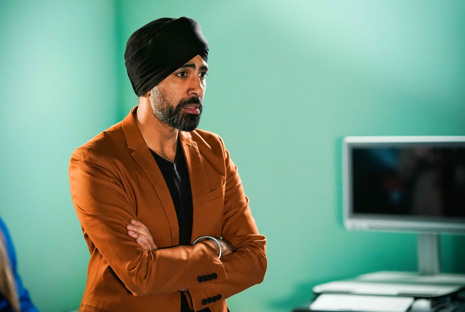 Concerned Kheerat Panesar talks to the doctor in hospital in EastEnders