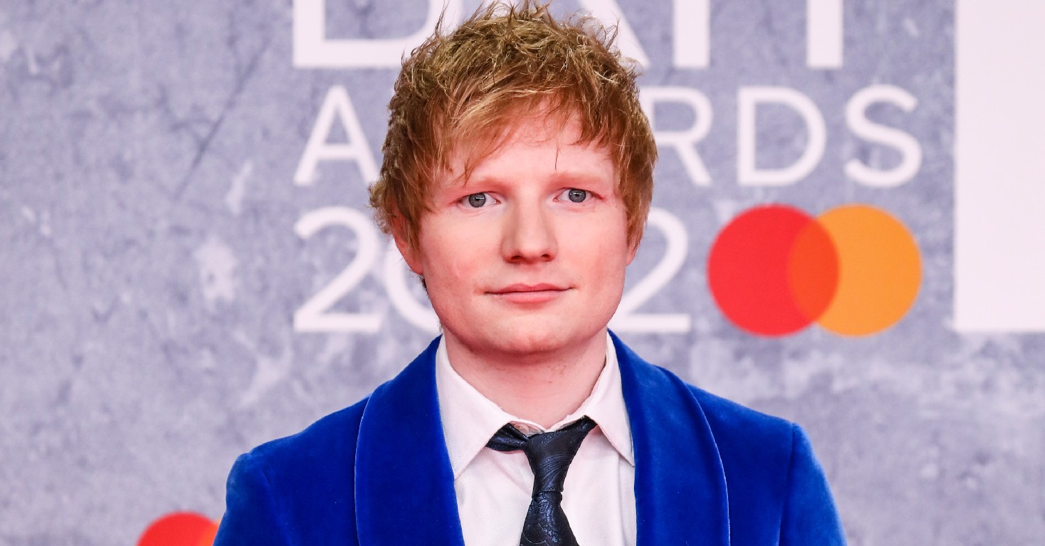 Ed Sheeran in a blue suit at the BRITs 
