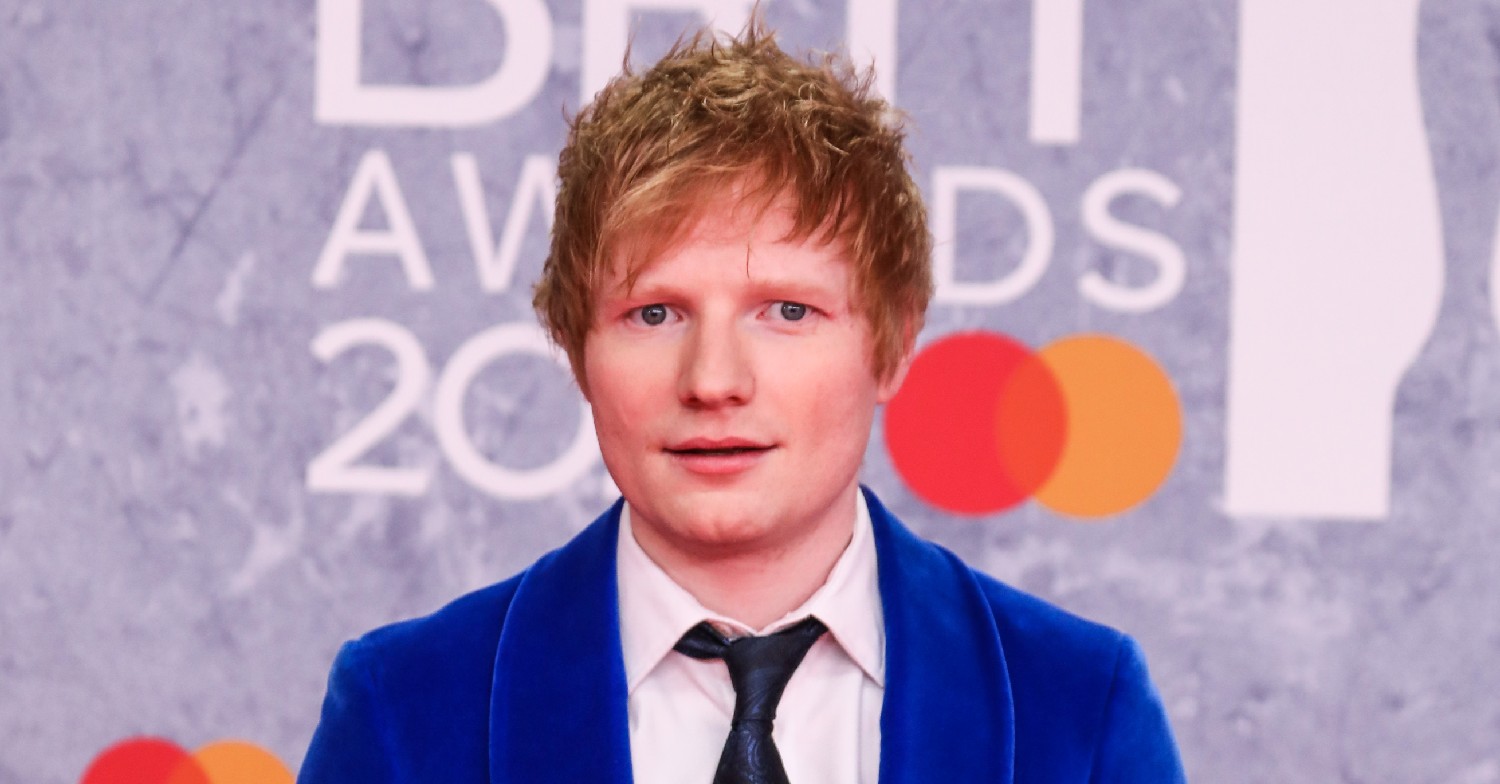 Ed Sheeran looking bemused on the BRITS red carpet