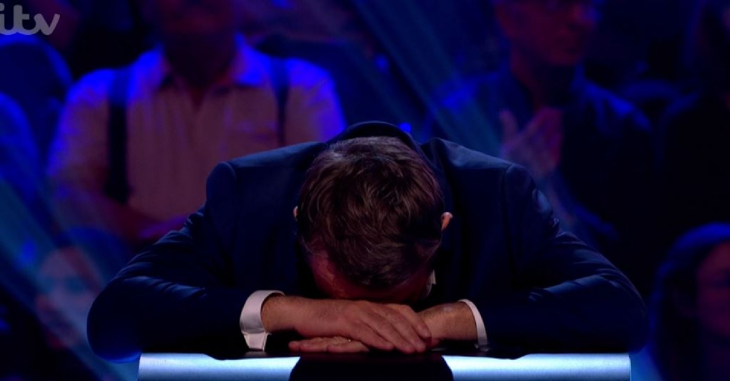 Bradley Walsh puts his head on his hands on Beat the Chasers 2022