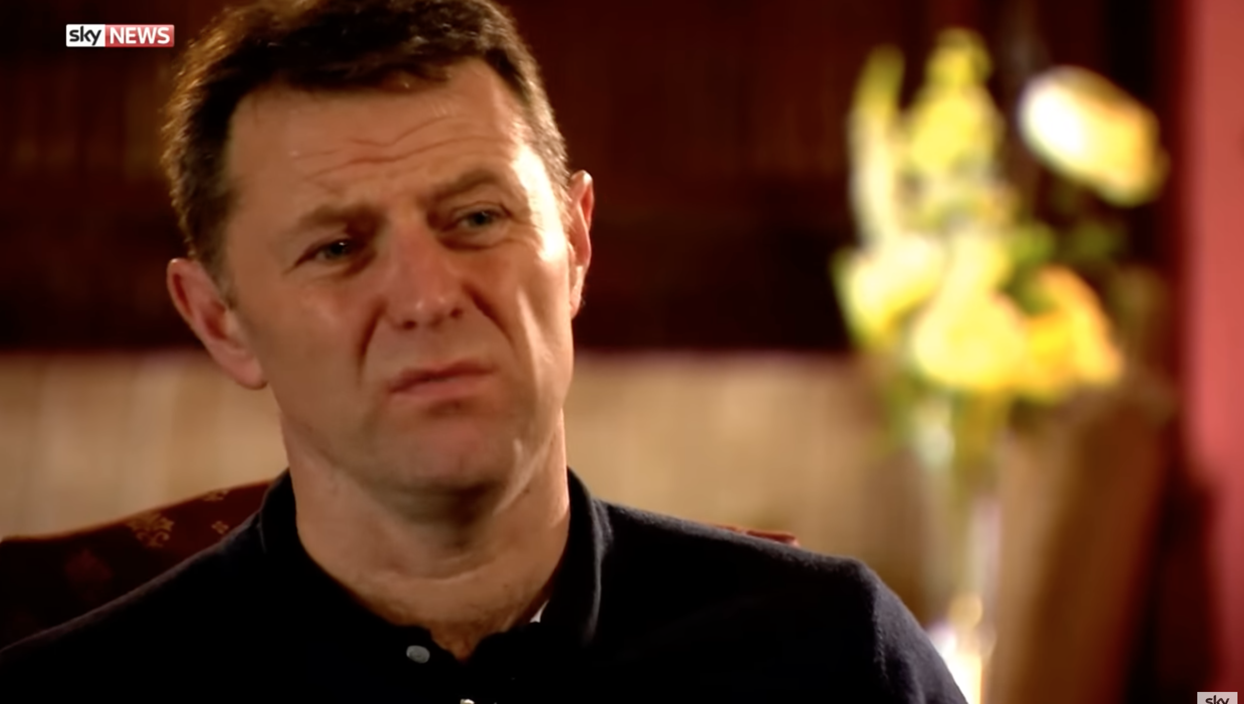 Gerry McCann looking upset in a TV interview