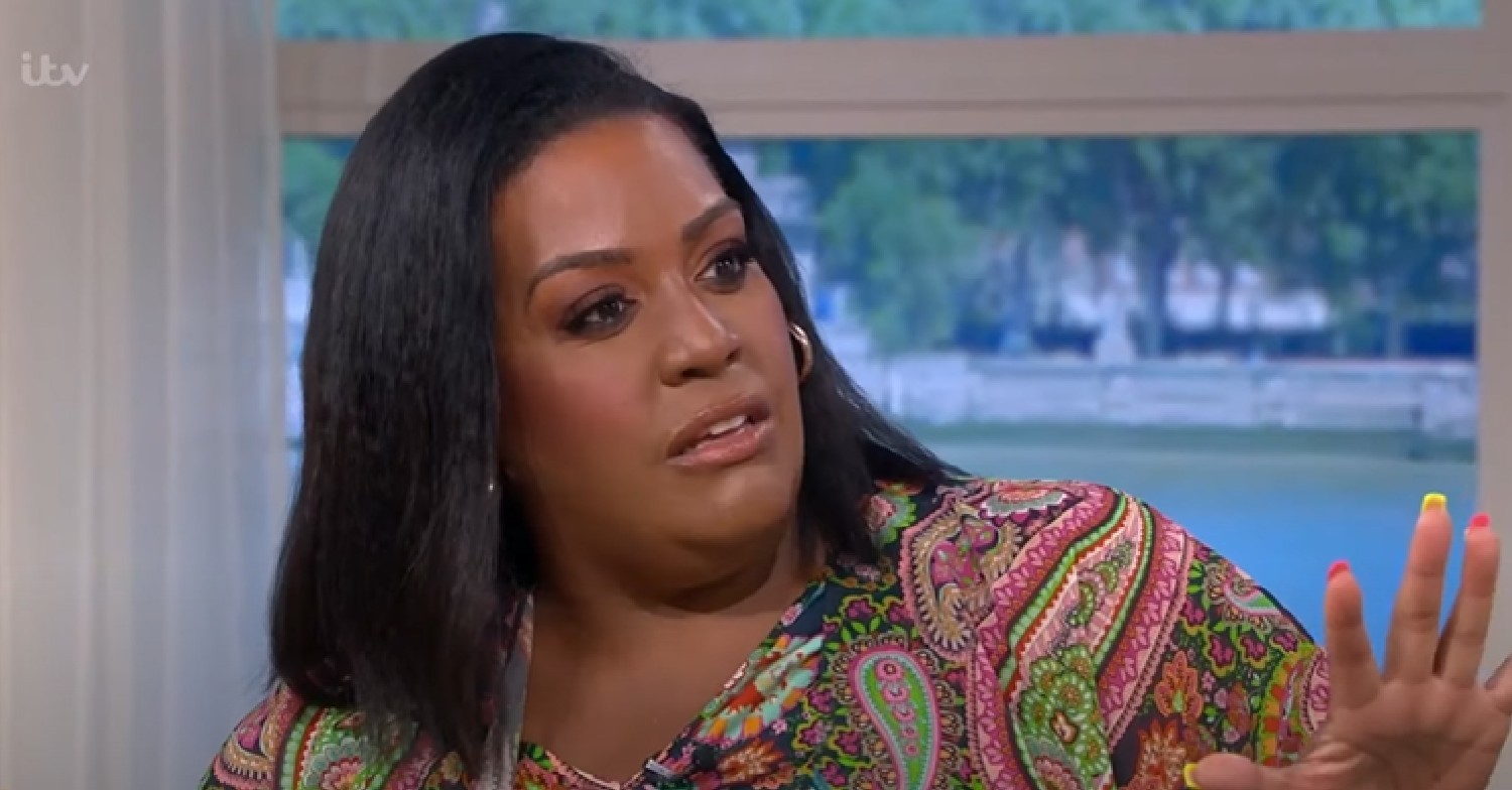 Alison Hammond looking serious and holding her hand up on This Morning on May 20, 2022