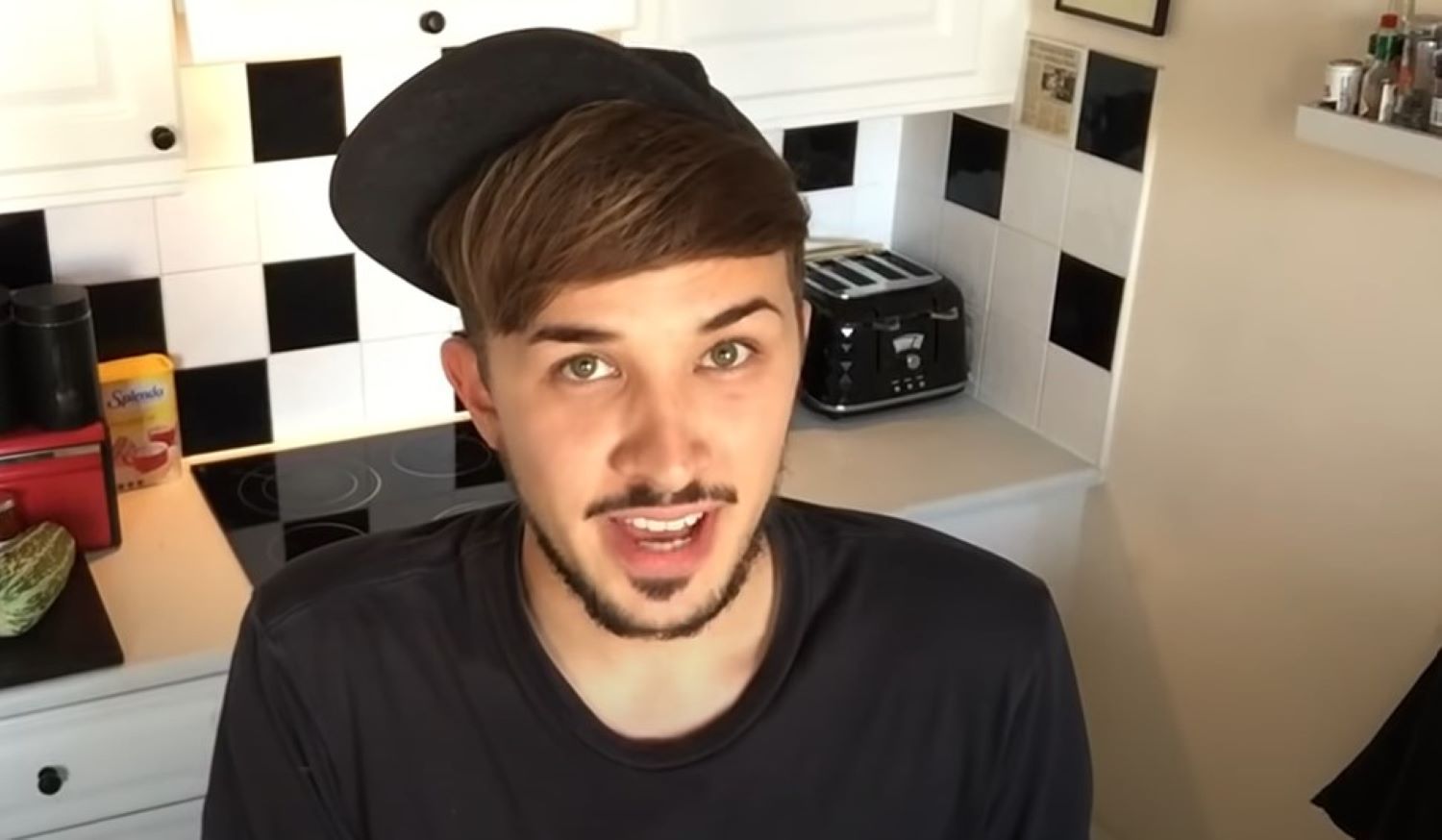 Martyn Hett smiles in his kitchen