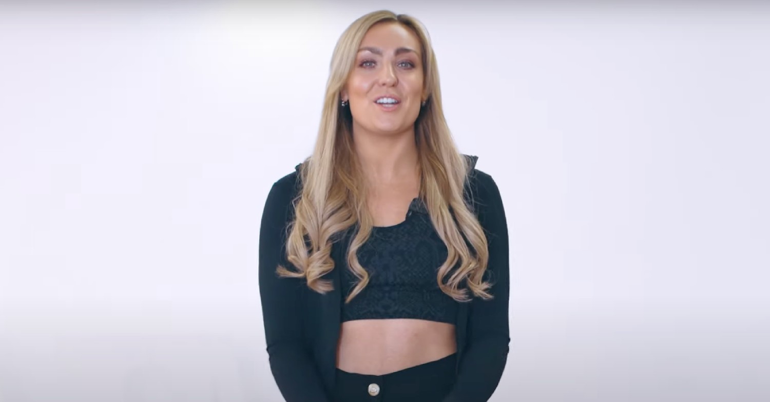 Strictly Come Dancing star Amy Dowden talking to camera on a white background 