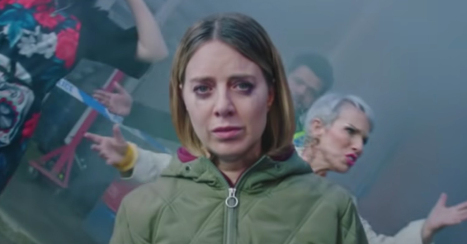 Coronation Street Abi Webster has mascara running down her face as she stands looking shellshocked