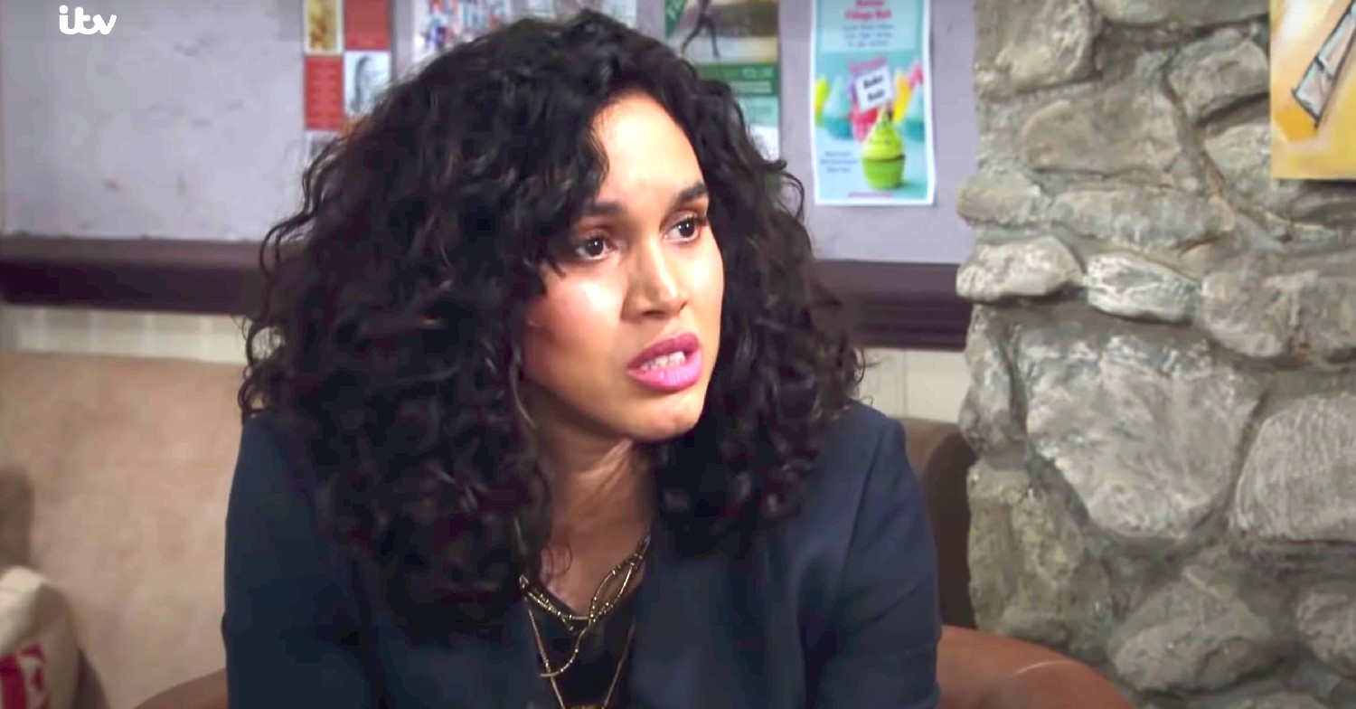 Suzy looks worried in Emmerdale