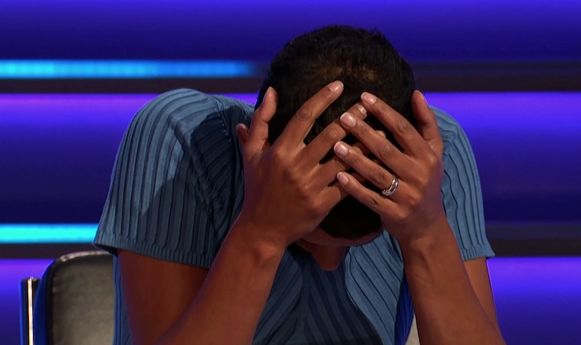 Naga Munchetty holding her head in her hands