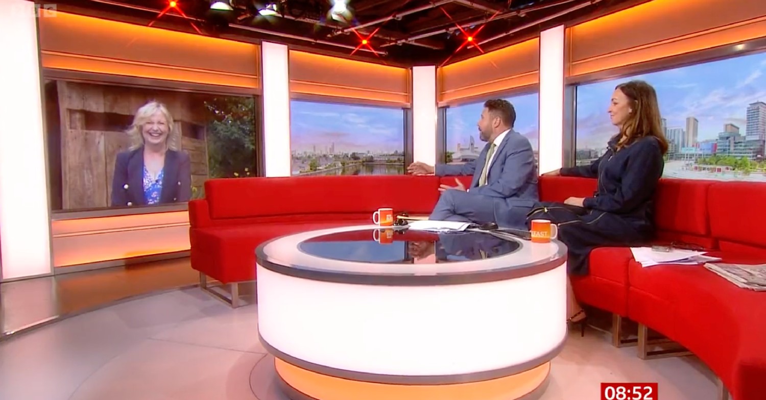 Carol Kirkwood appearing via a screen, speaking to Jon Kay and Sally Nugent on BBC Breakfast