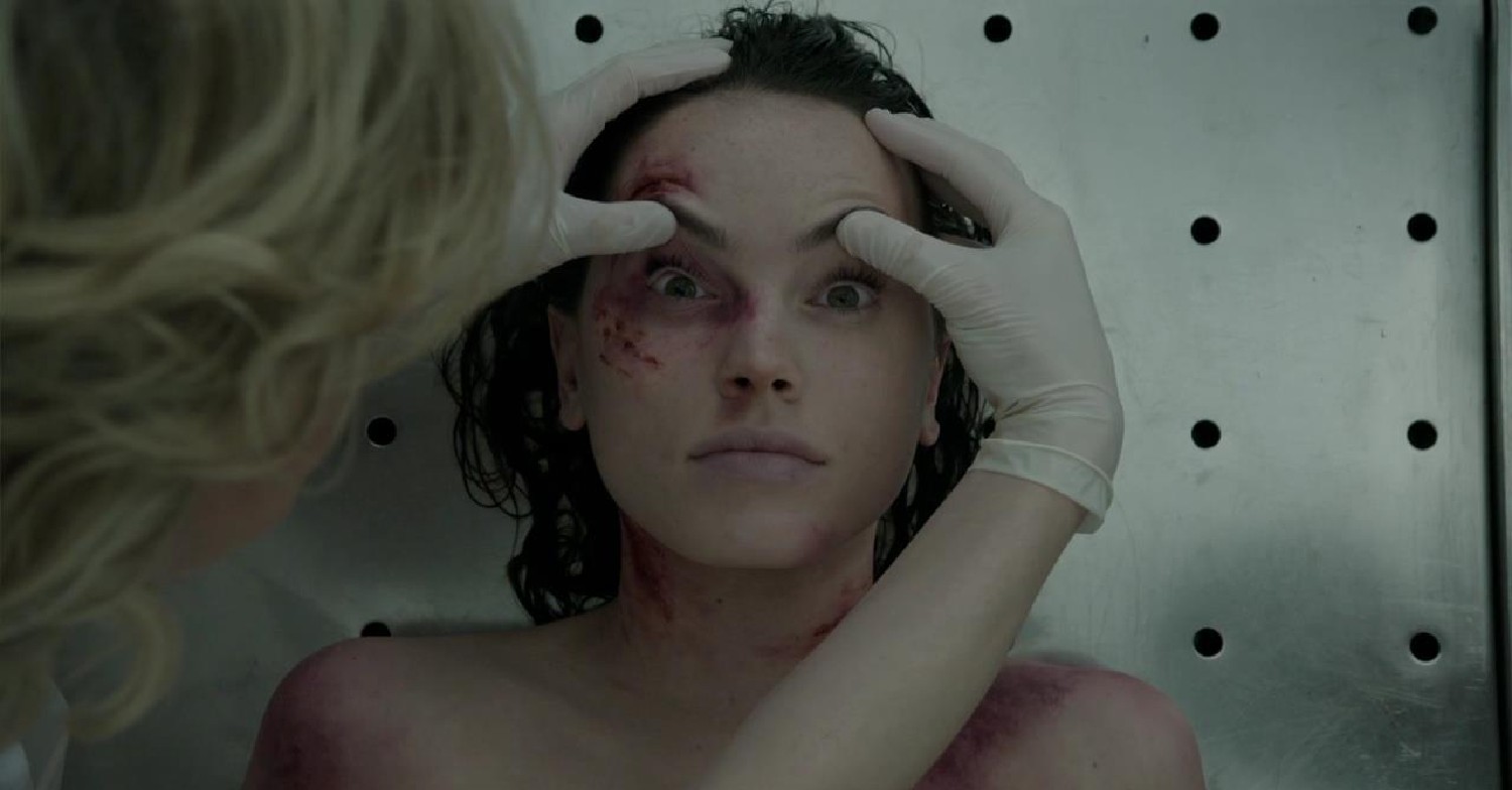 Daisy Ridley as a corpse