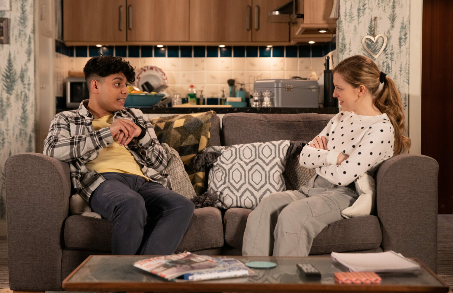 Corrie Aadi and Summer talk on the sofa