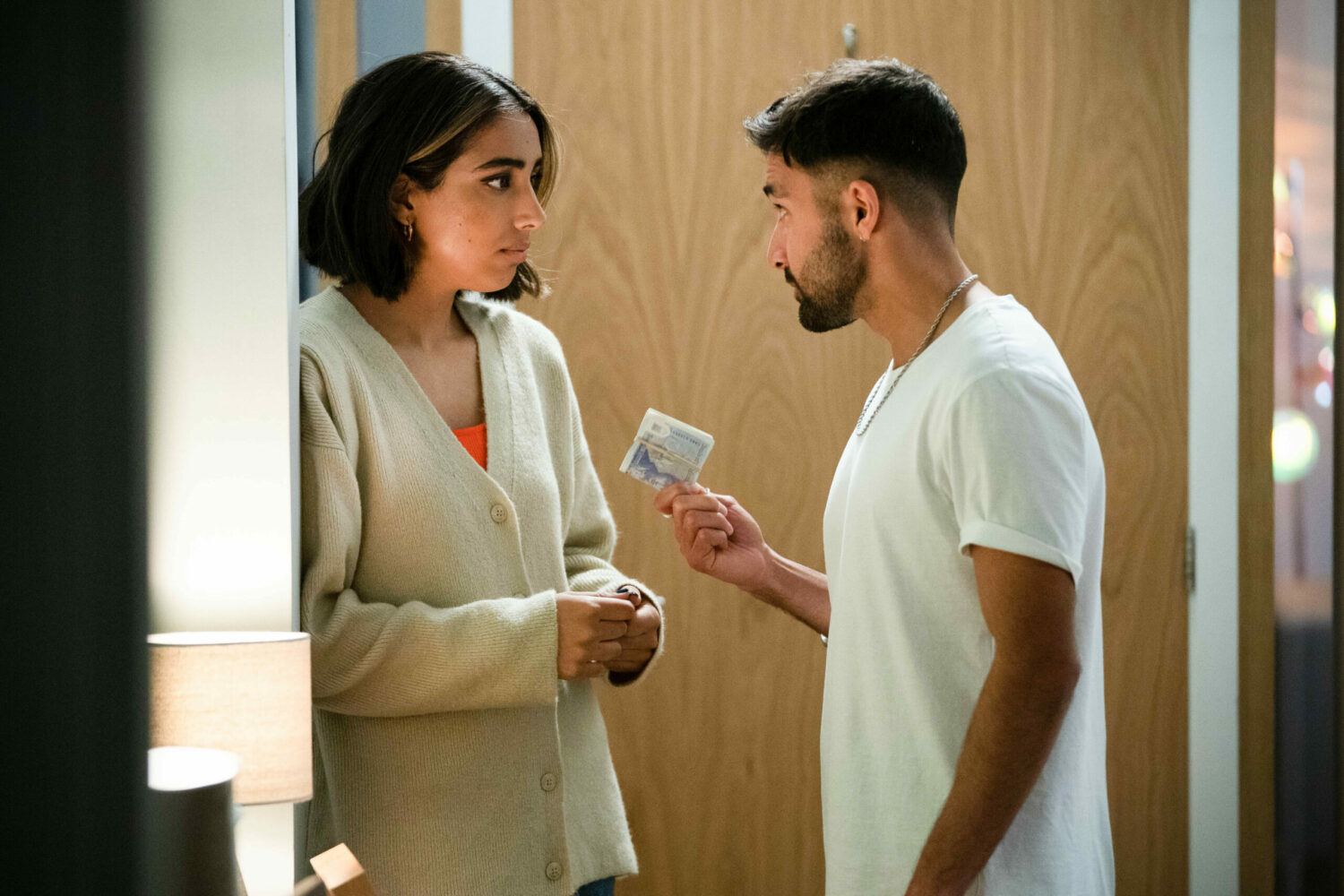 Vinny giving cash to Ash in EastEnders