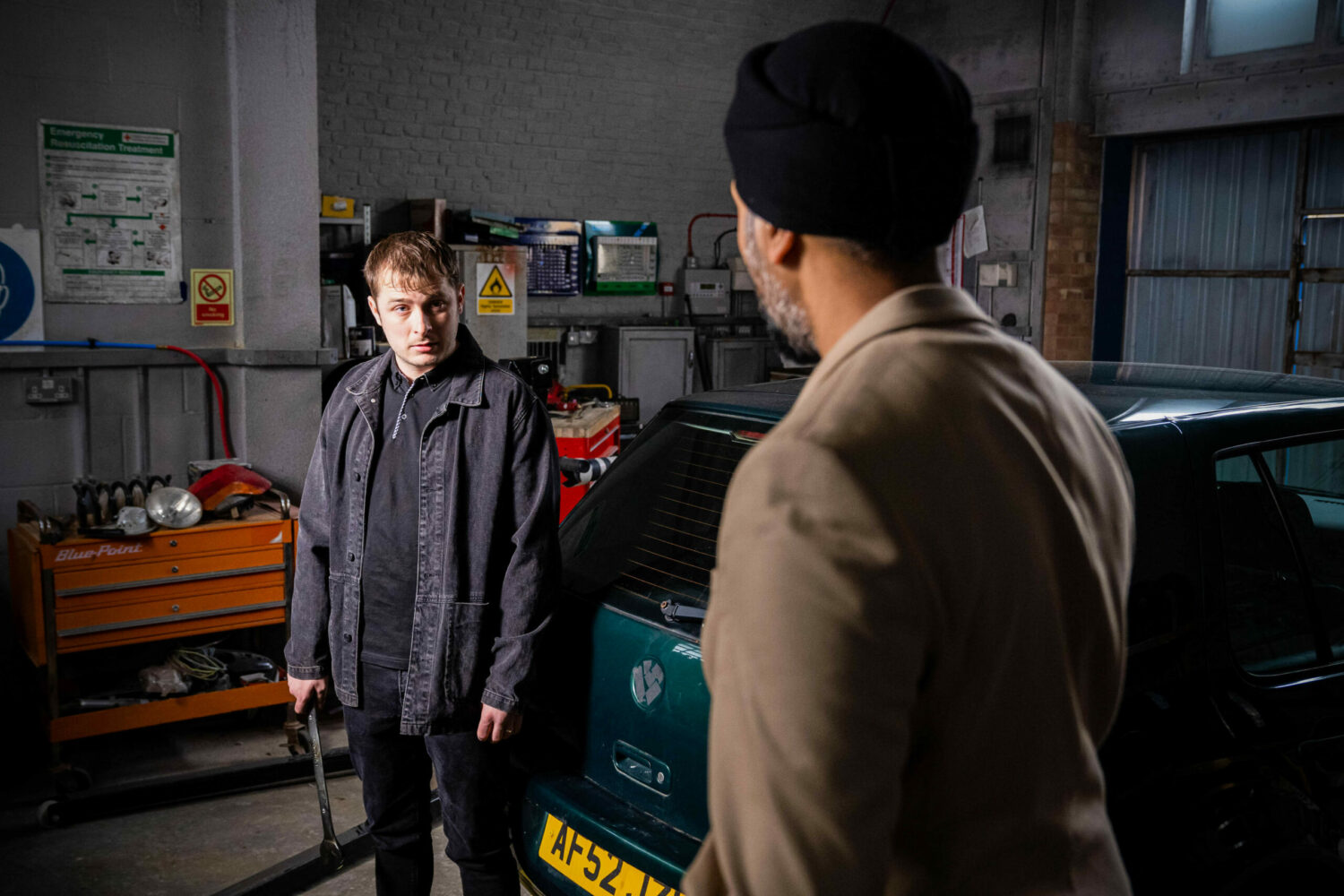 Ben Mitchell looks at Kheerat Panesar who is alarmed at the state of him