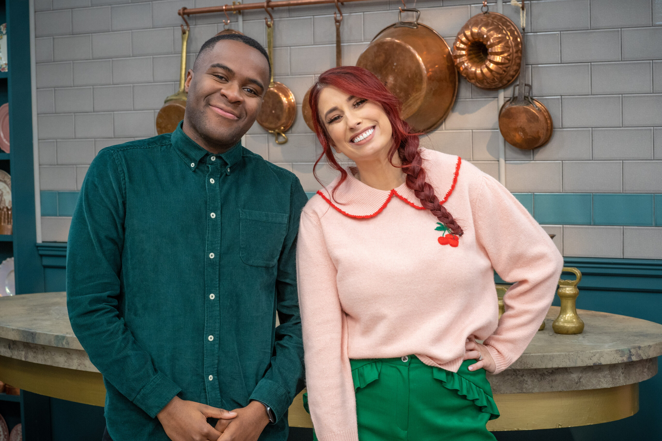 Stacey Solomon smiling on Bake Off with Liam Charles