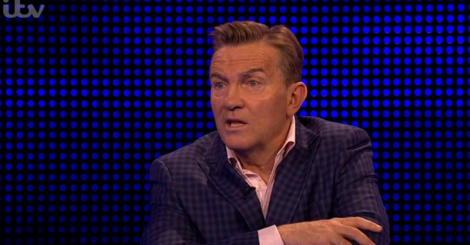 Bradley Walsh looks stunned with his arms folded on The Chase