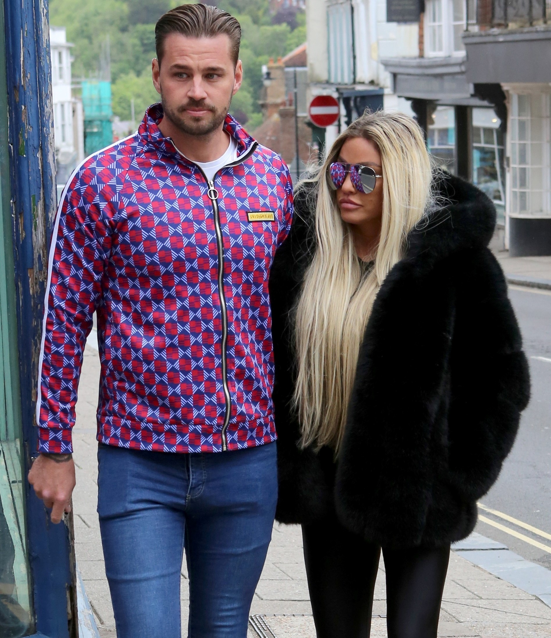 Carl Woods and Katie Price look downcast at Lewes Crown Court