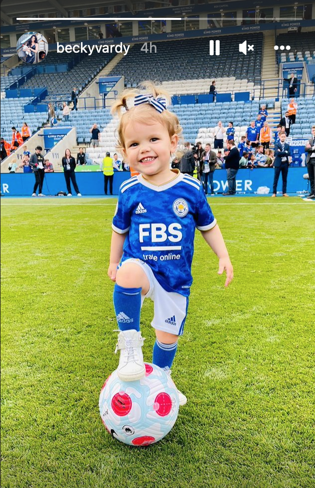 Rebekah Vardy's little girl on the pitch smiling
