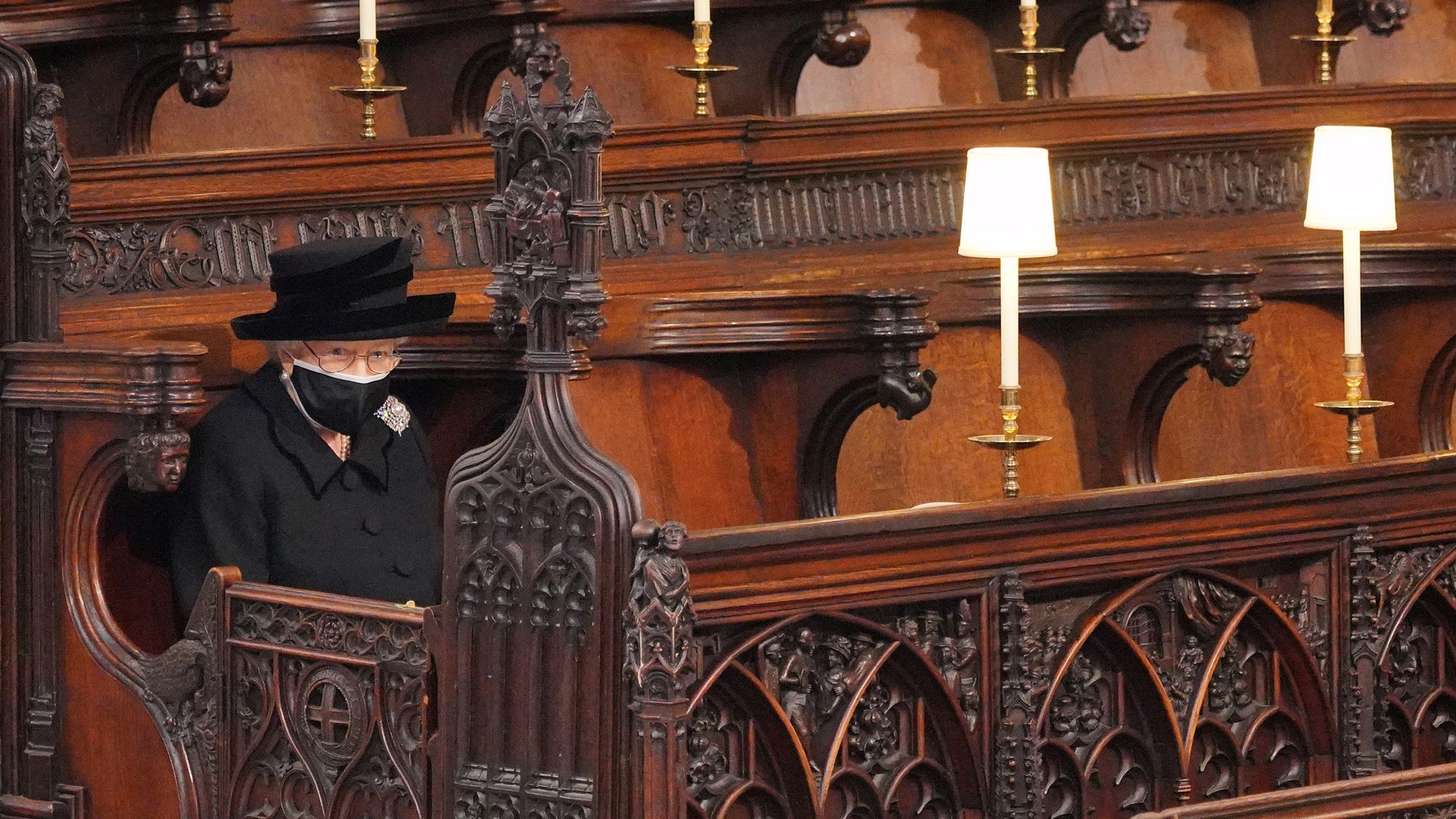 The Queen sitting alone at Philip's funeral