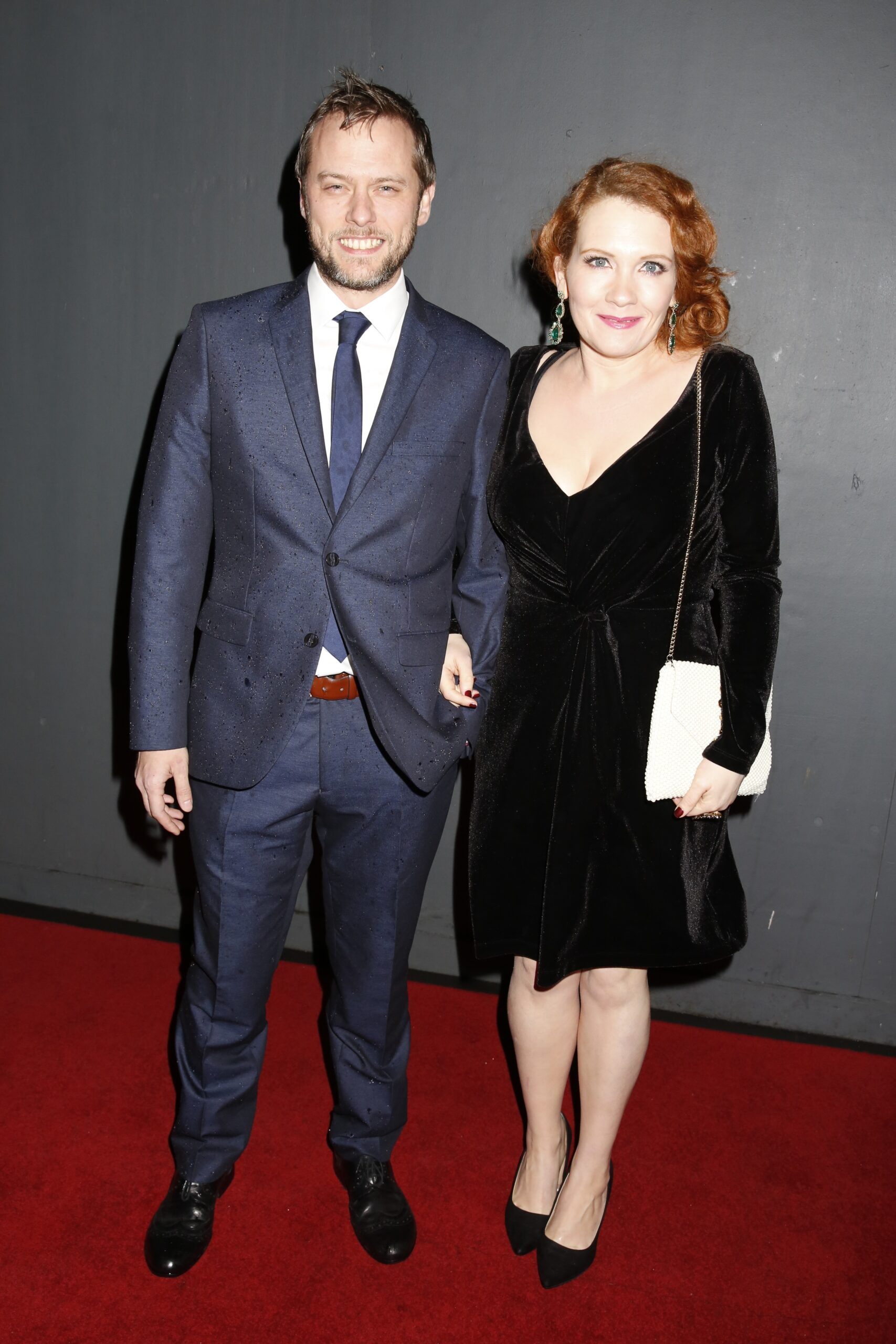 Chris Farr and Jennie McAlpine smile together on the red carpet