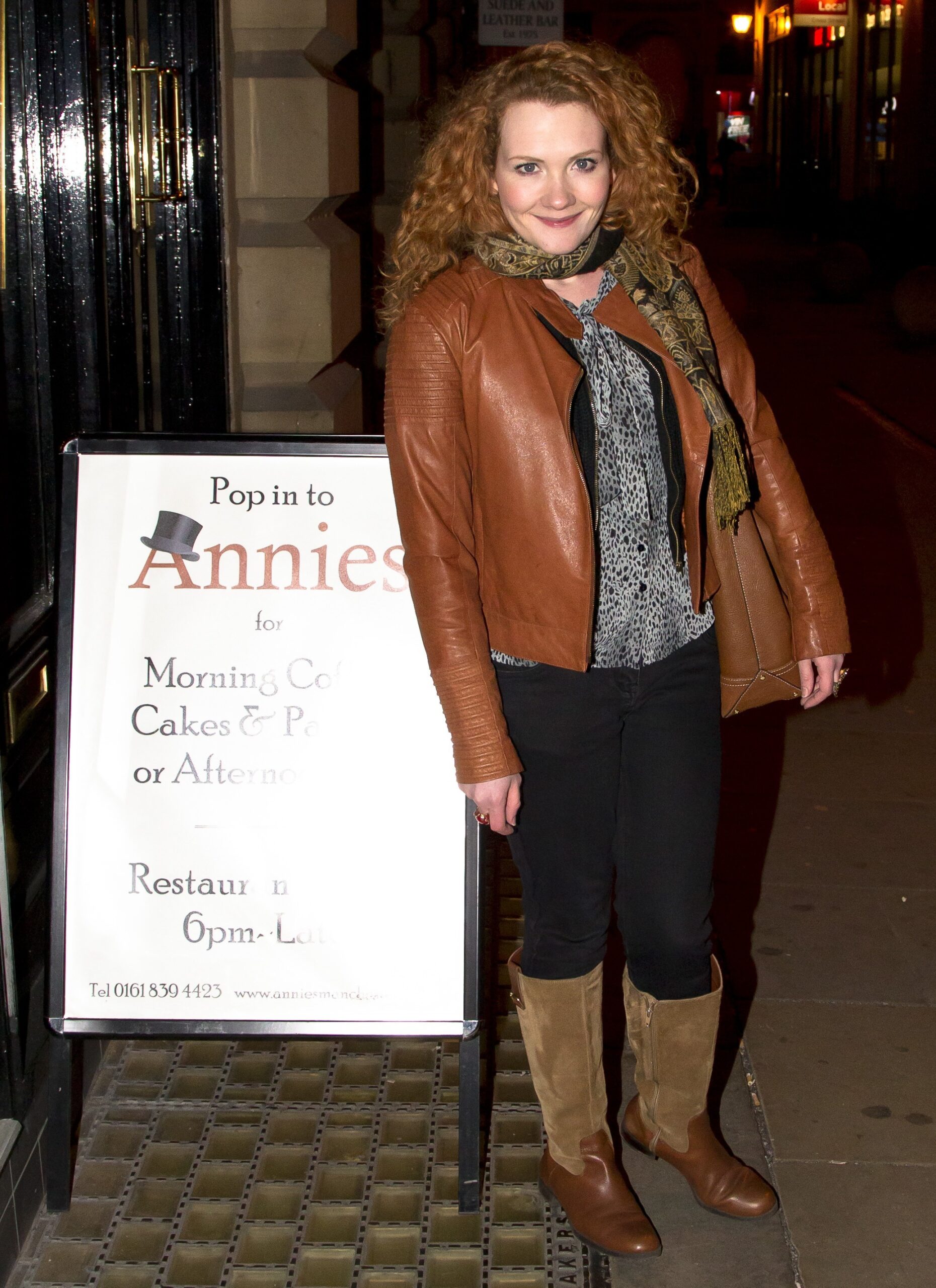 Jennie McAlpine smiles outside her restaurant Annies