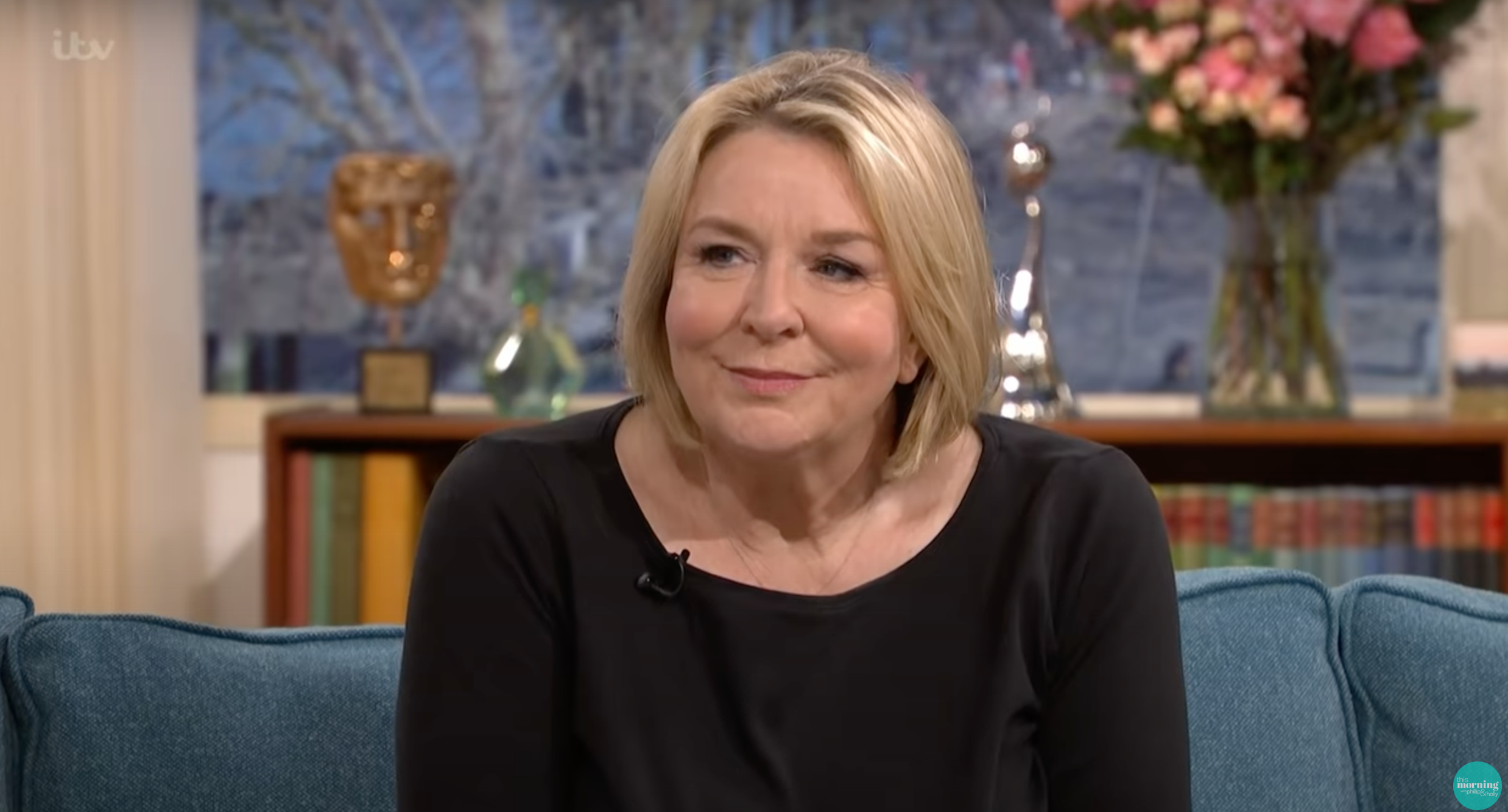 Fern Britton smiling on sofa on This Morning