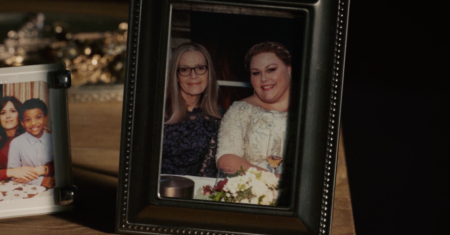 A photograph of Rebecca and Kate in a frame