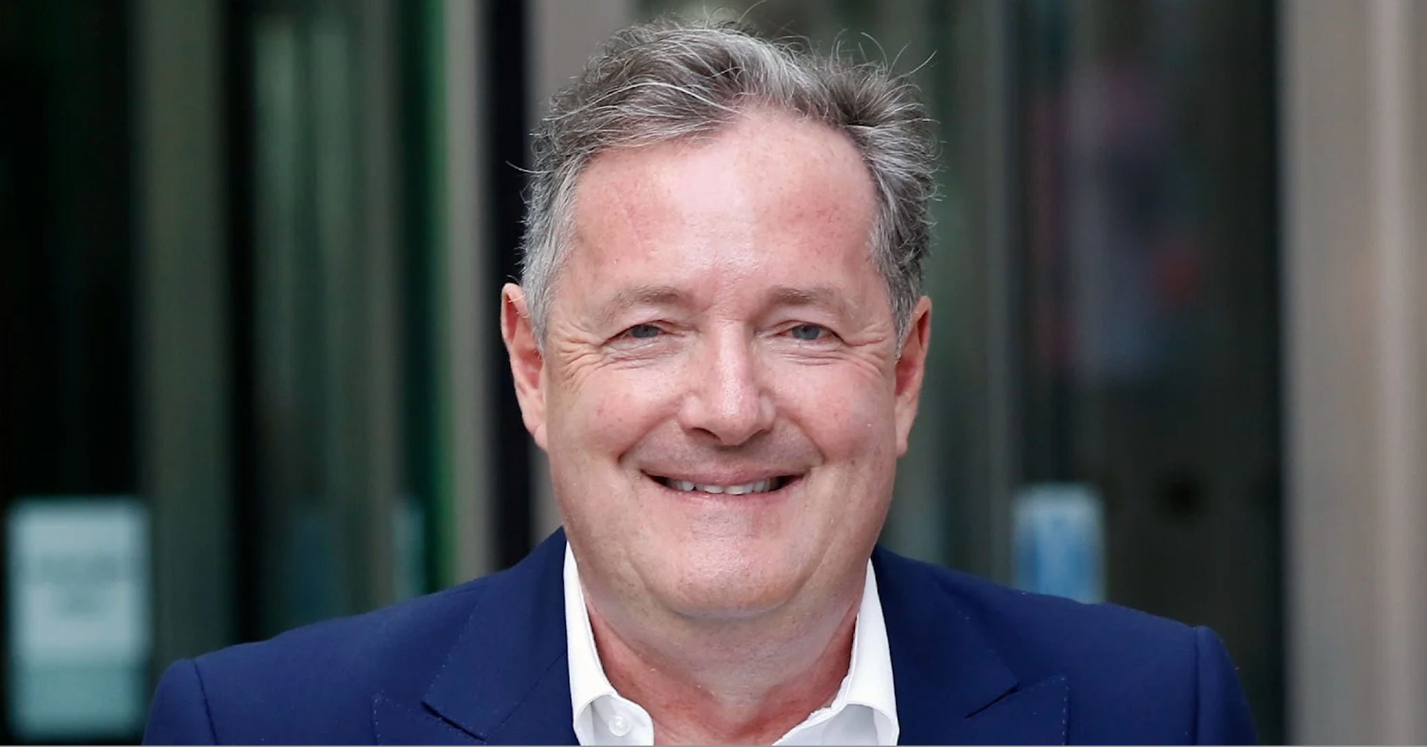 Piers Morgan smiling