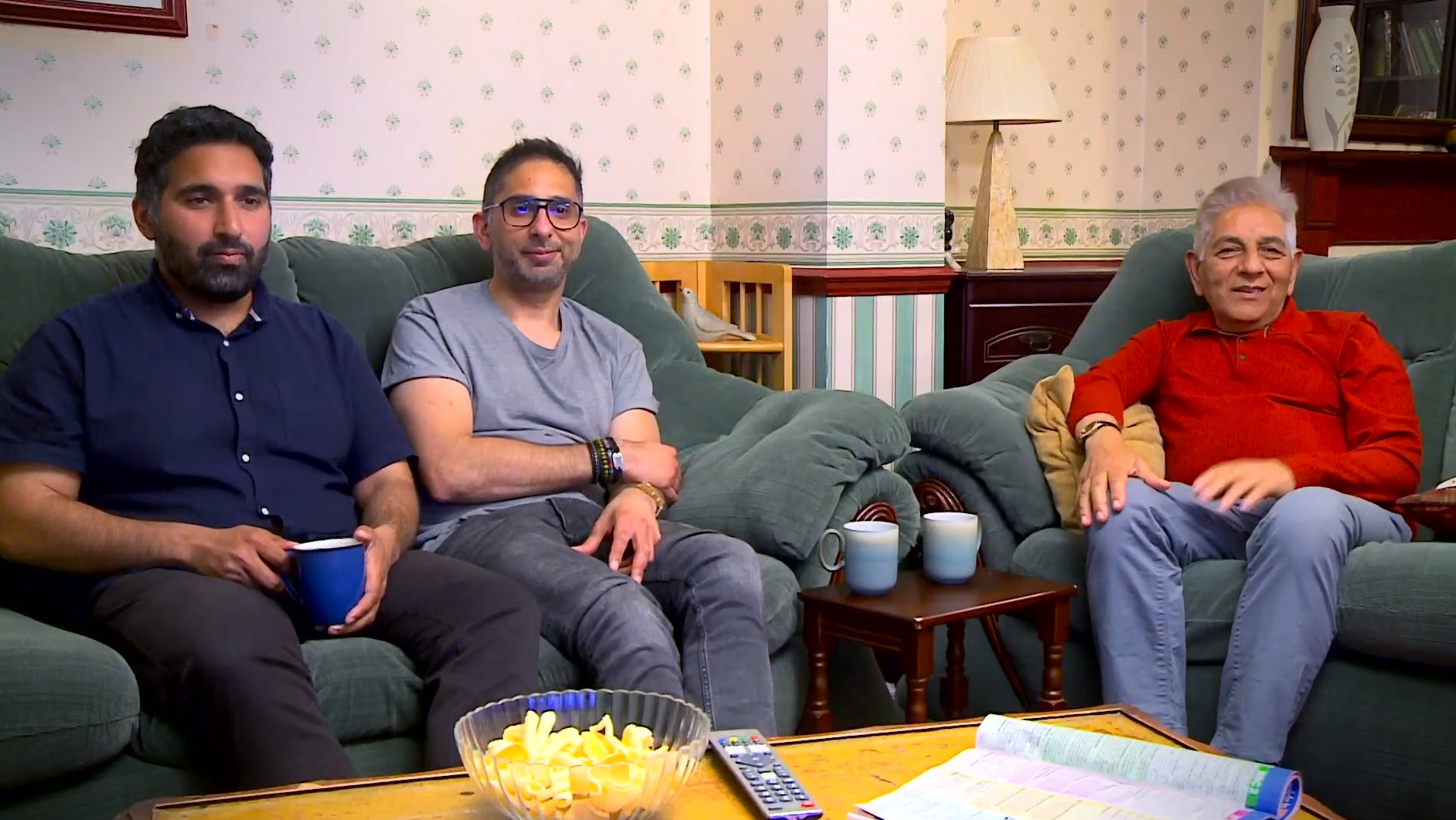 Gogglebox The Siddiquis watch telly on their sofa