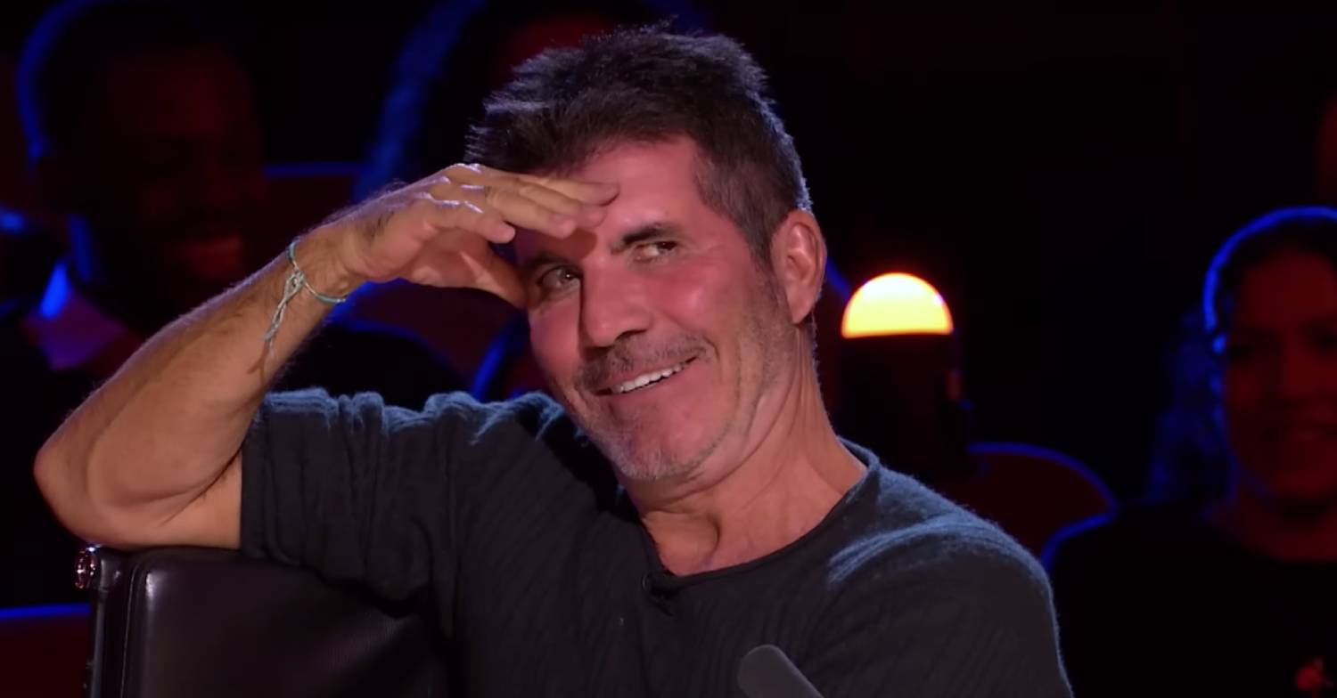 Simon Cowell looks incredulous as he put his hand to his brow