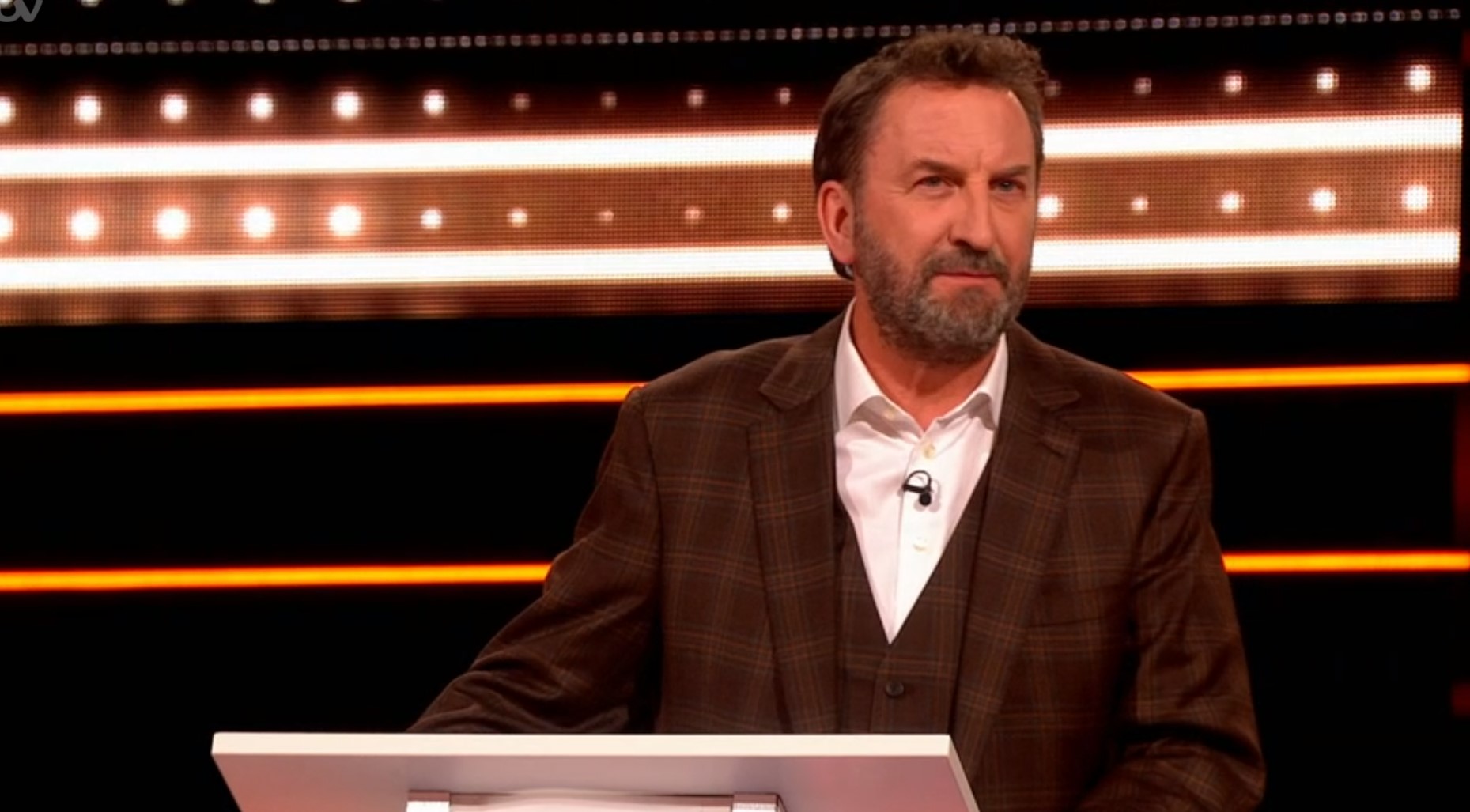 Lee Mack looks serious hosting the 1% Club