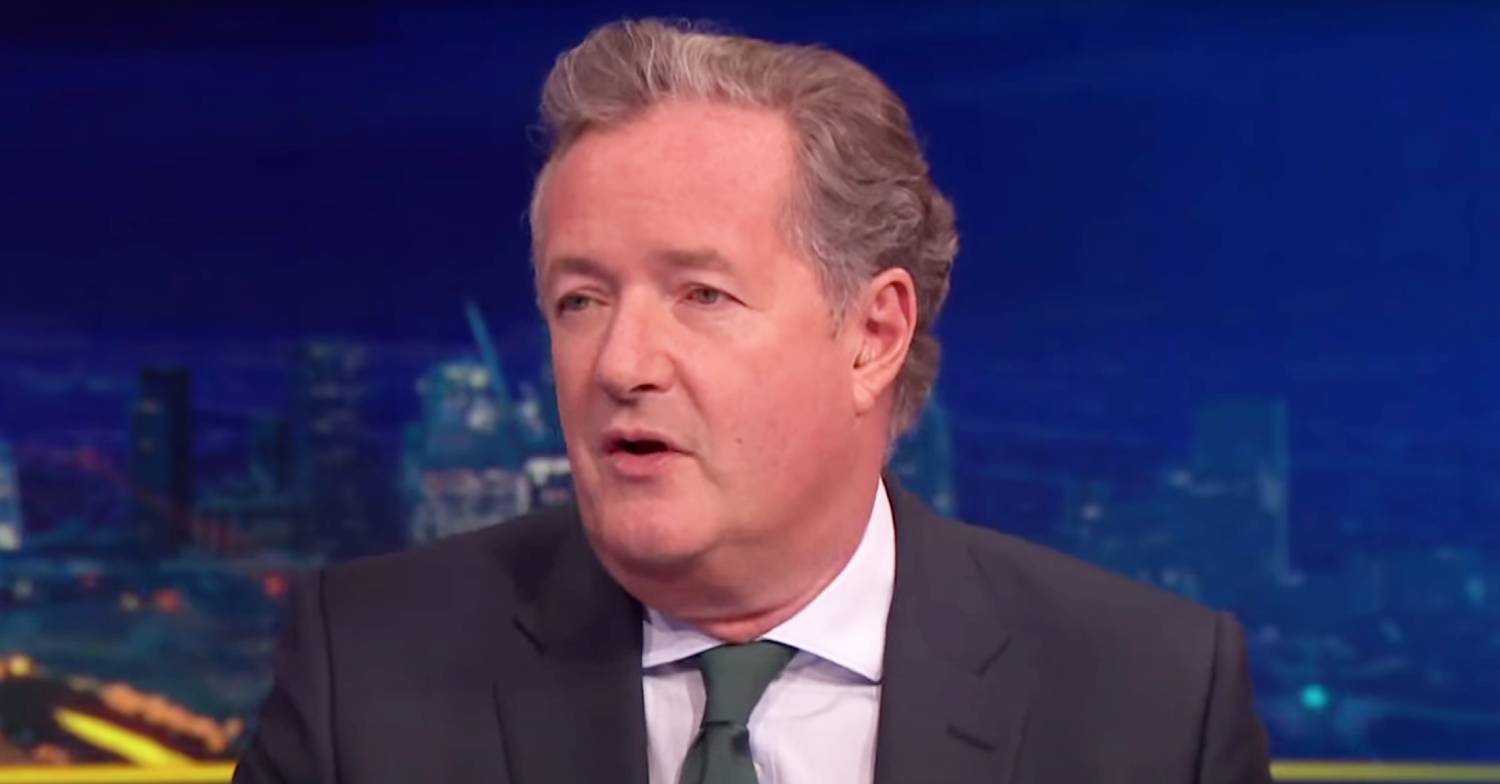 Piers Morgan addresses a guest on his show