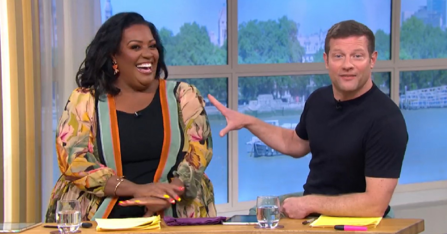 Alison Hammond laughing as Dermot O'Leary speaks at camera on This Morning