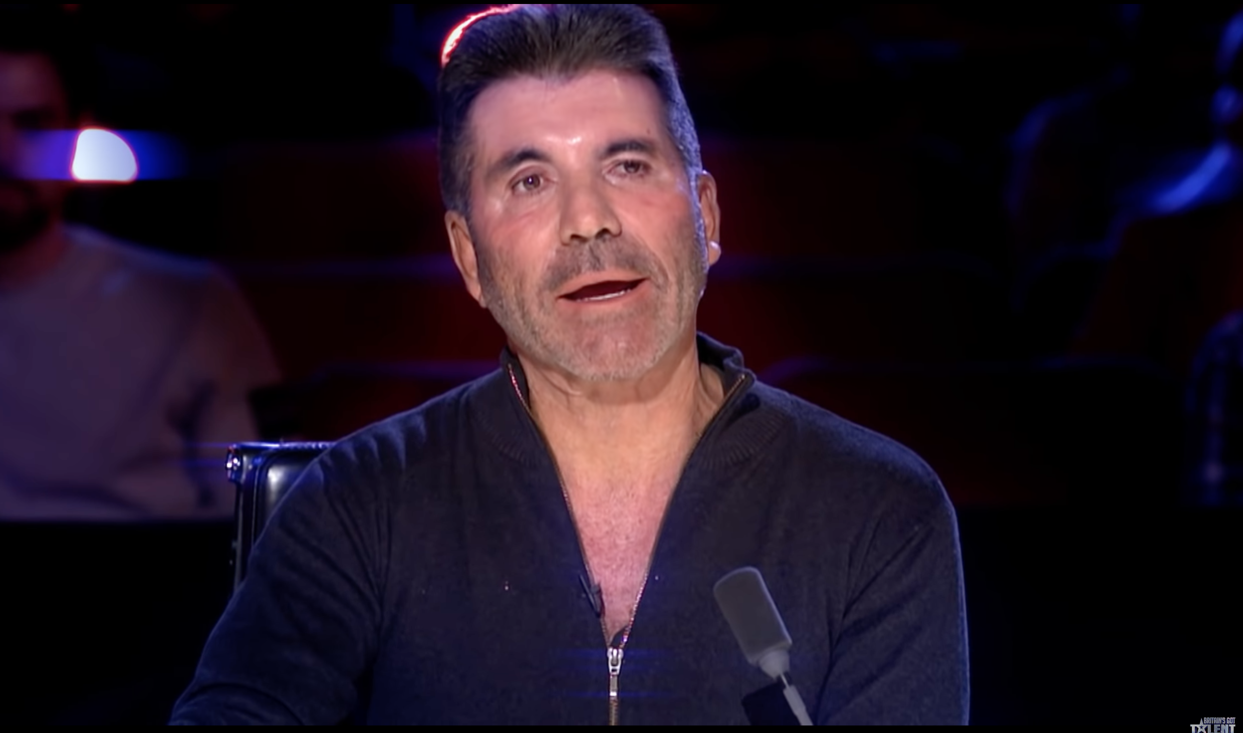 Simon Cowell sitting on the BGT judging panel
