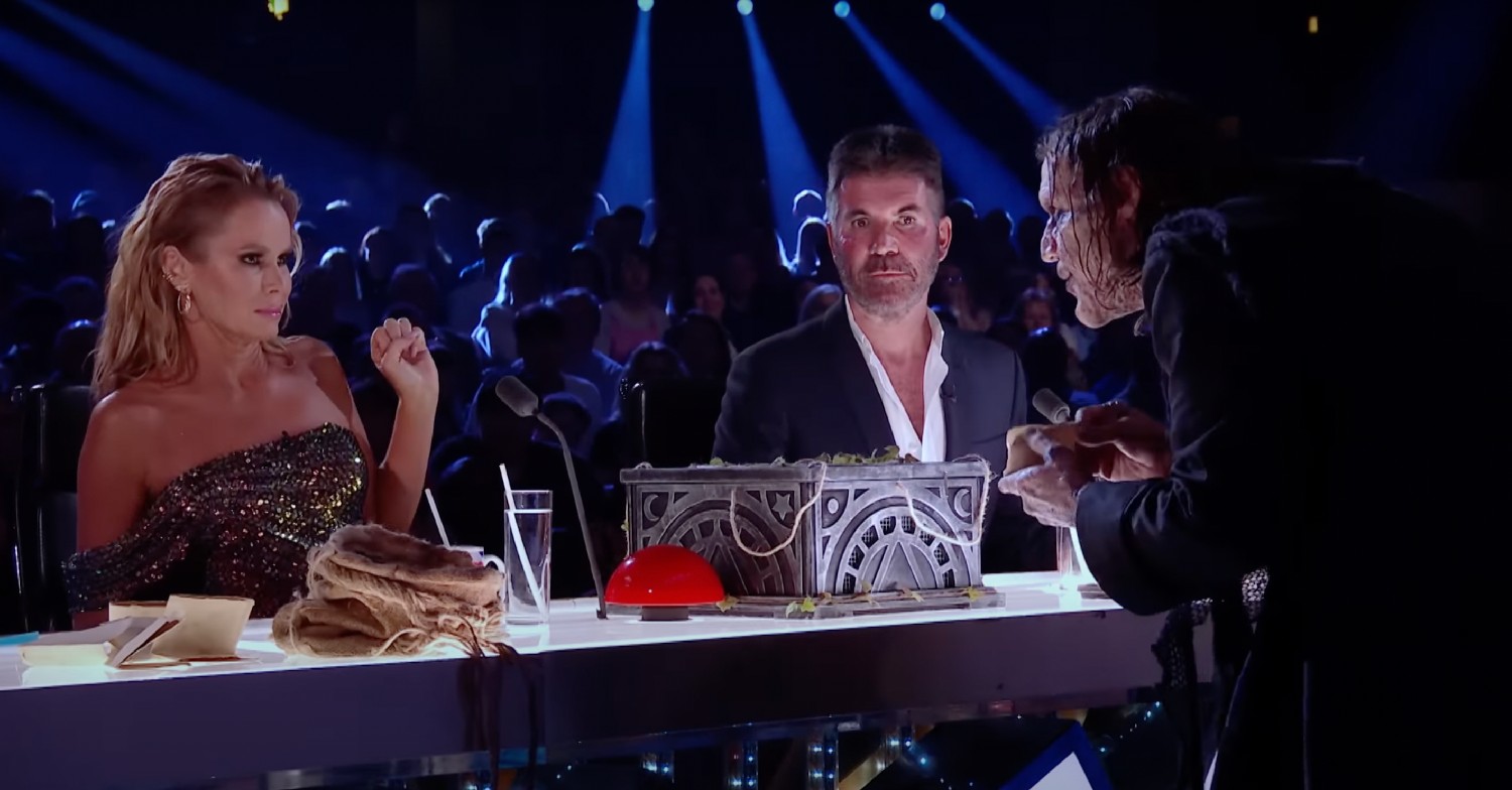 Amanda Holden recoiling from the Witches on Britain's Got Talent. Simon Cowell looks surprised 