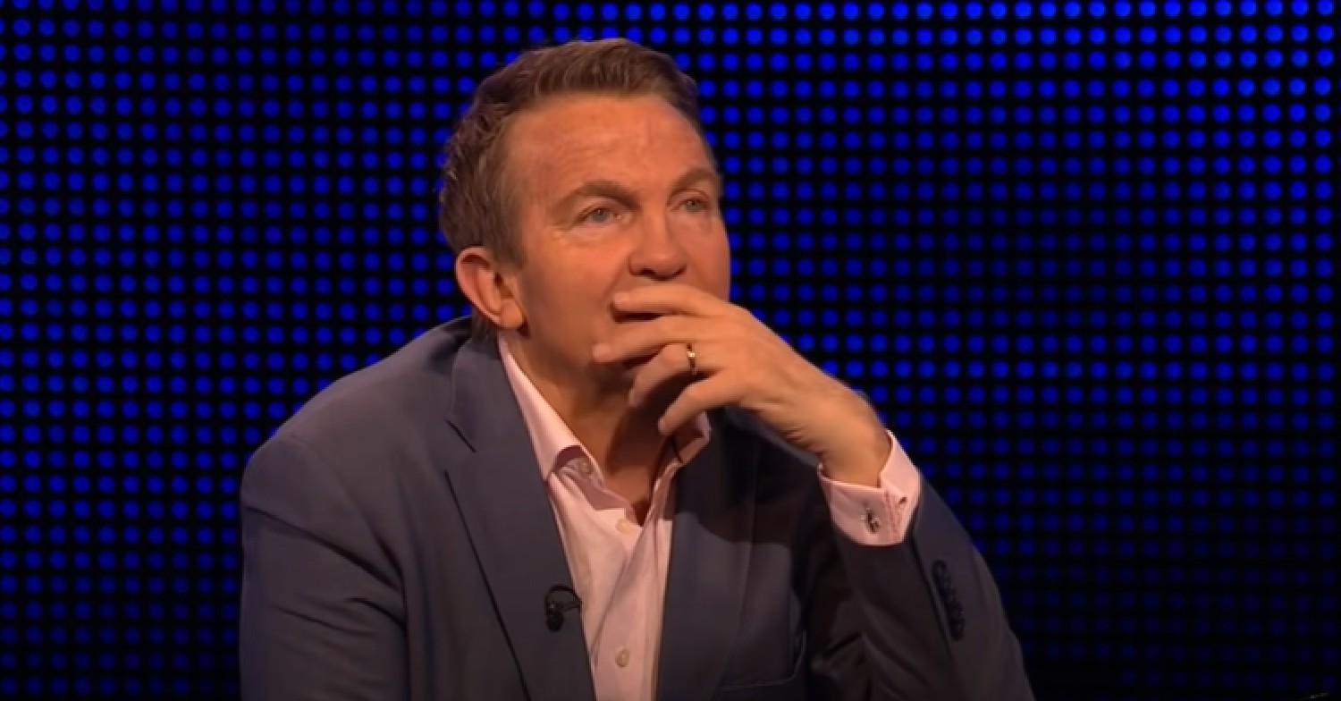 Bradley Walsh with his hand over his mouth on The Chase