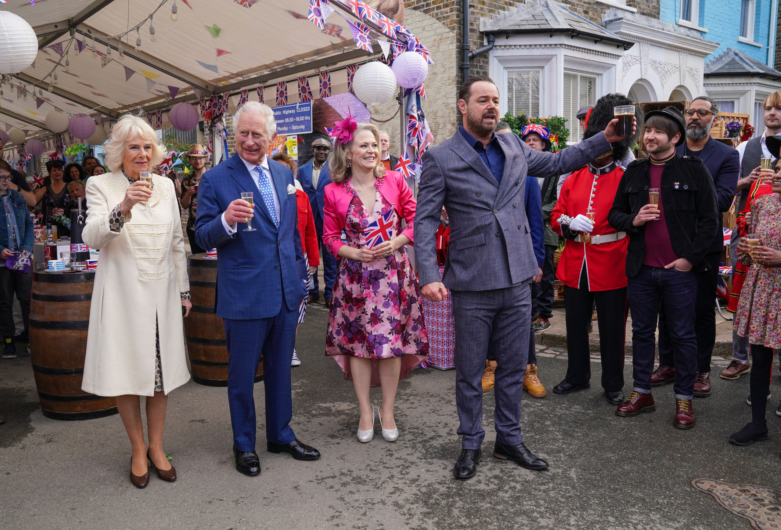 The Prince of Wales and The Duchess of Cornwall visit Walford Mick Linda EastEnders