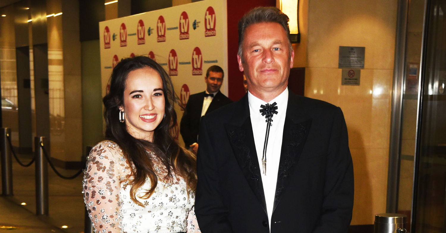 Chris smiling with stepdaughter Megan McCubbin at a media event (Credit: Splash News)