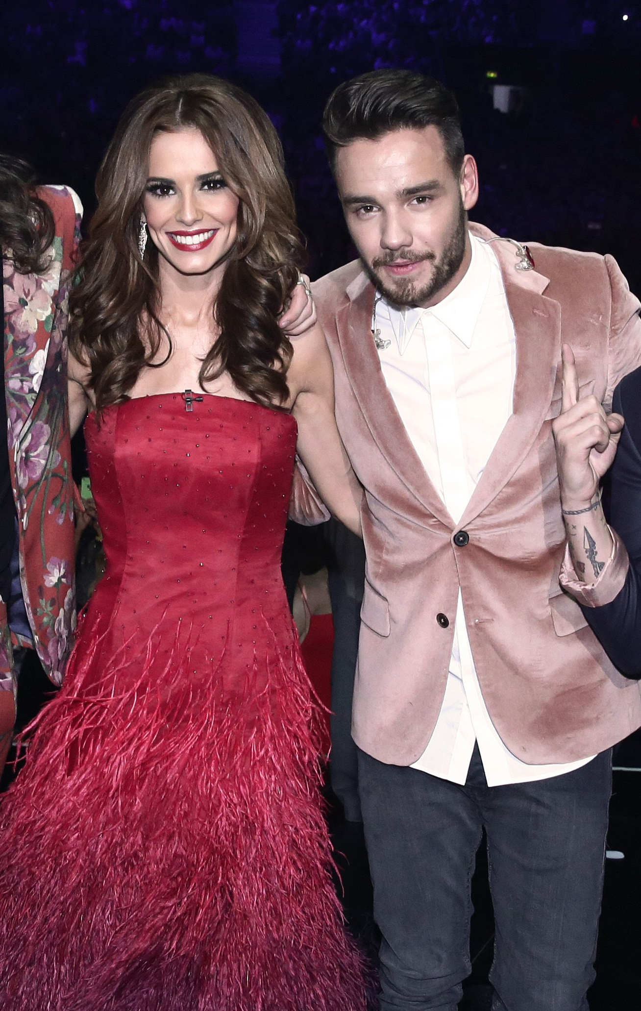 Liam Payne and Cheryl Tweedy smiling at a party