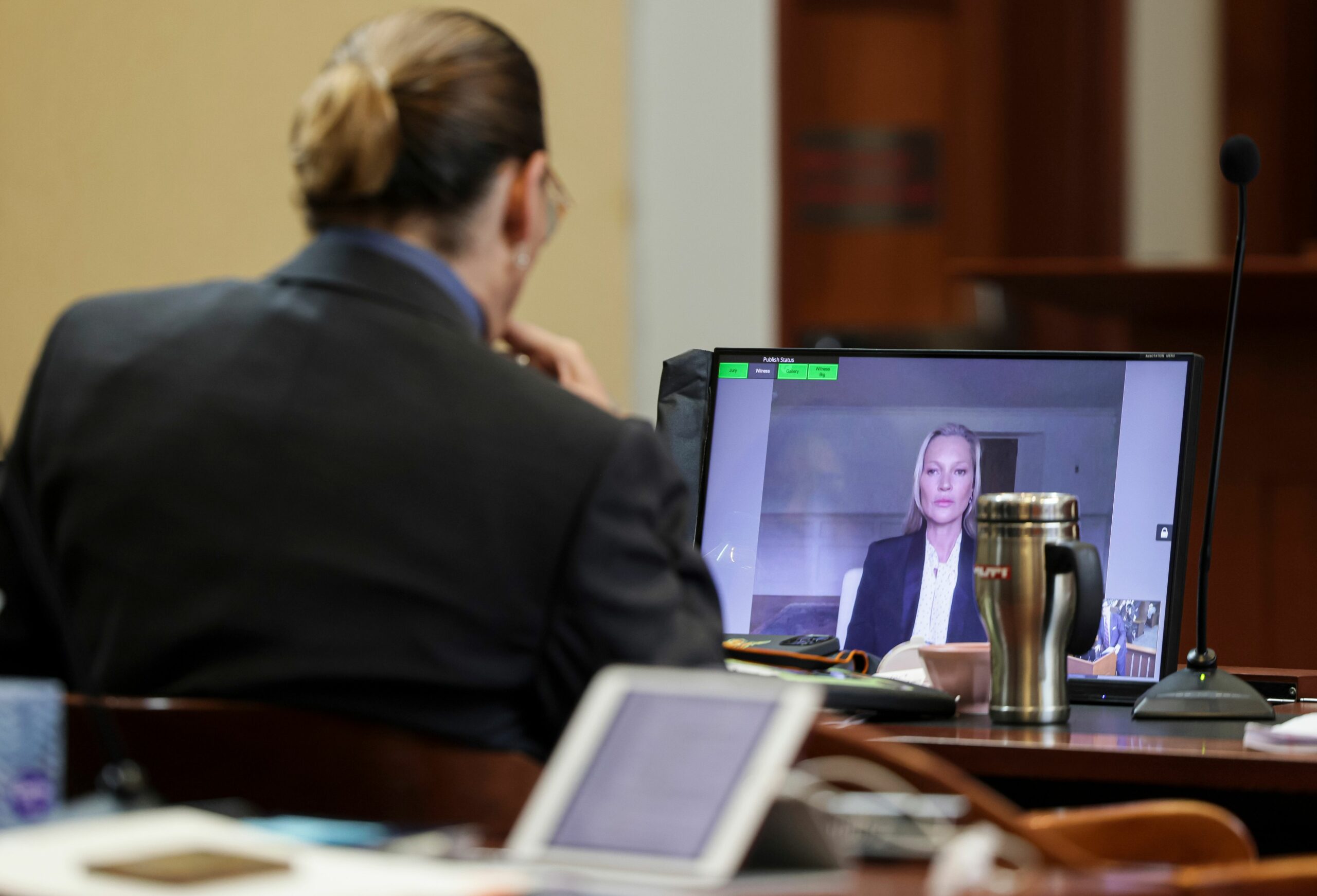 Johnny Depp watches Kate Moss testify at his trial